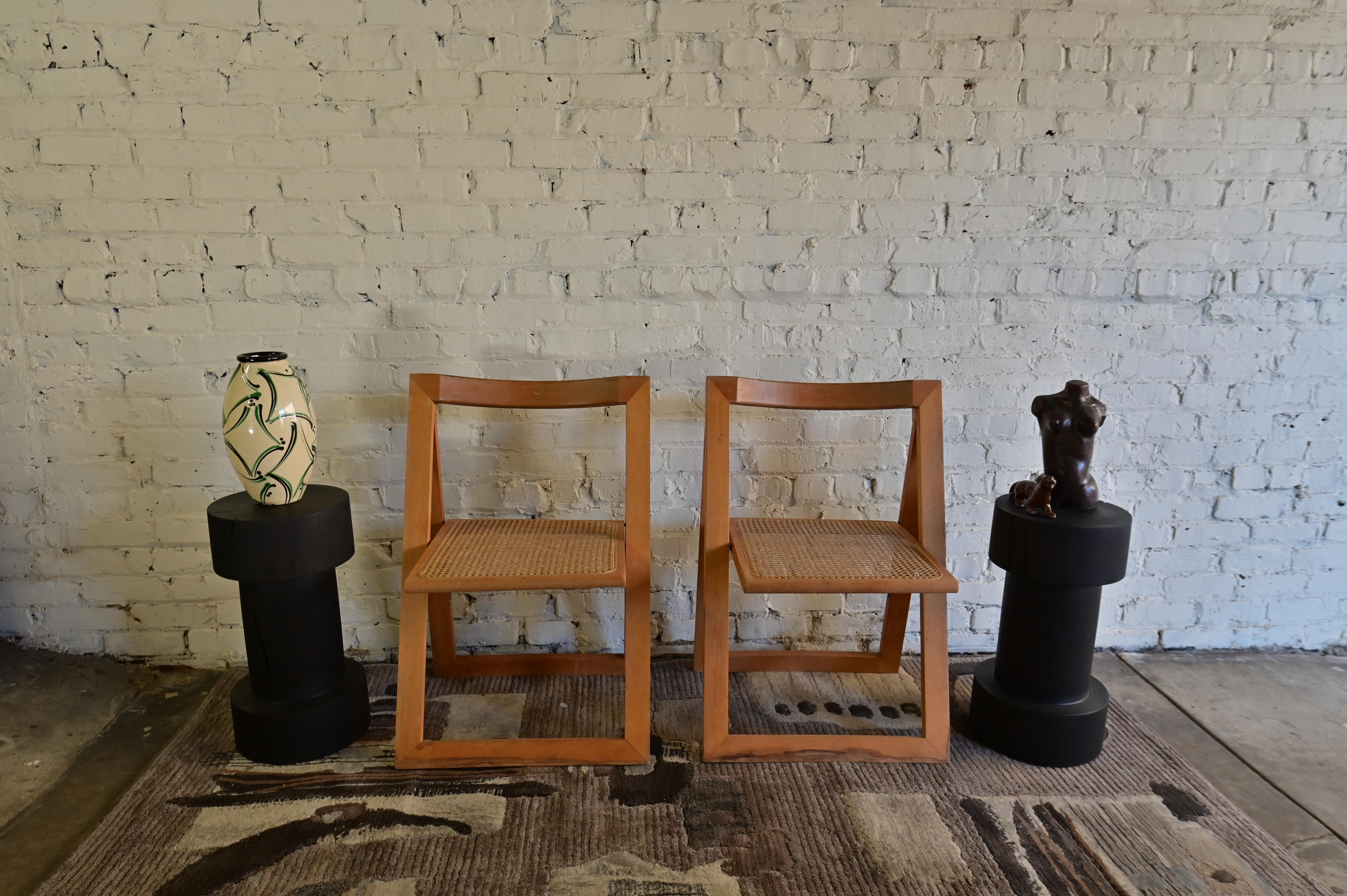 Pair of solid cherry wood end tables/stools, dyed black and finished with a durable wax finish. These minimal pieces function perfectly as either tables or stools, and are versatile enough to compliment any interior. Very solid and sturdy. Has a