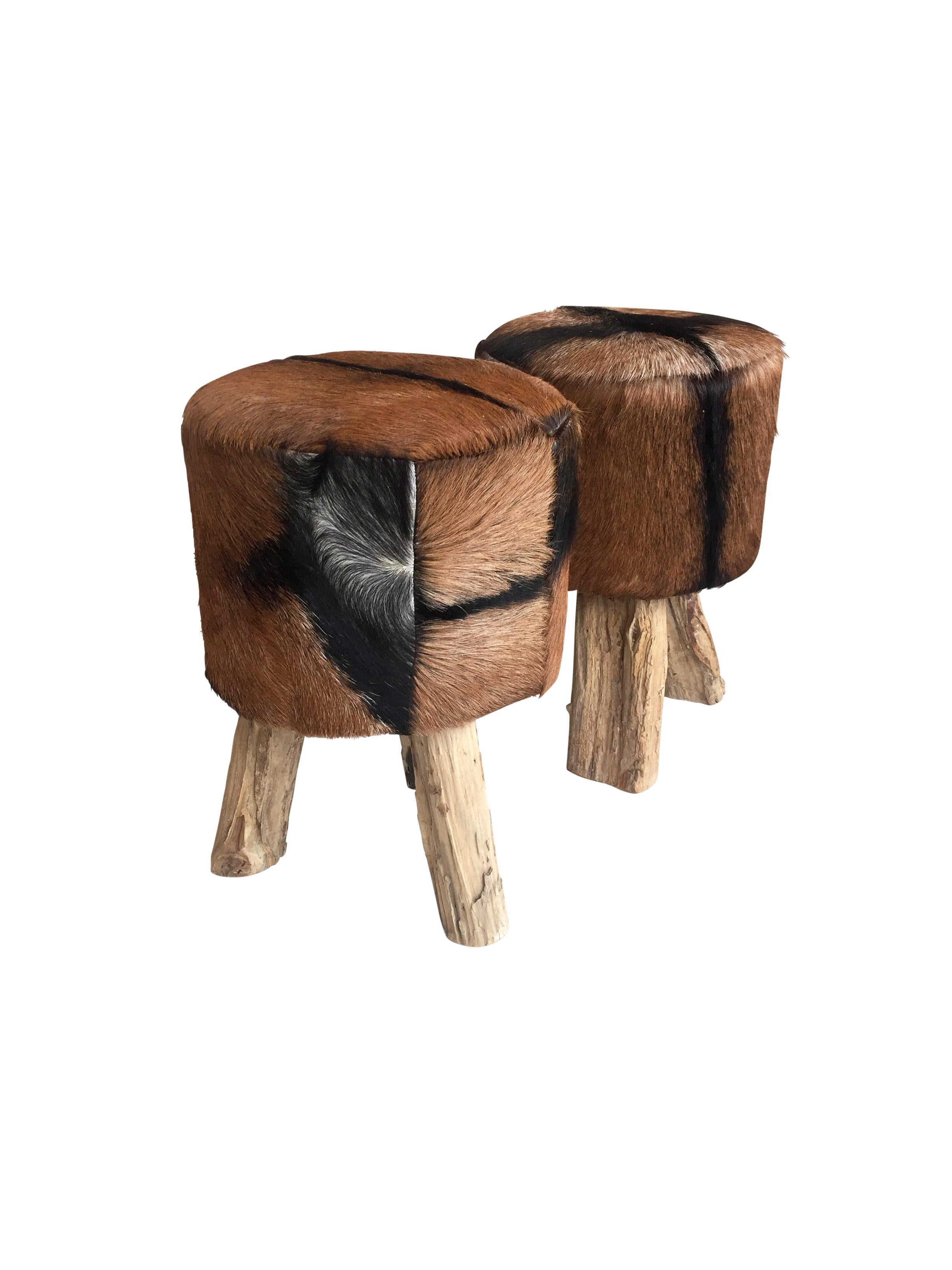 Pair of Primitive Nubuck Hide Stools with Wood Legs In Good Condition In Chicago, IL