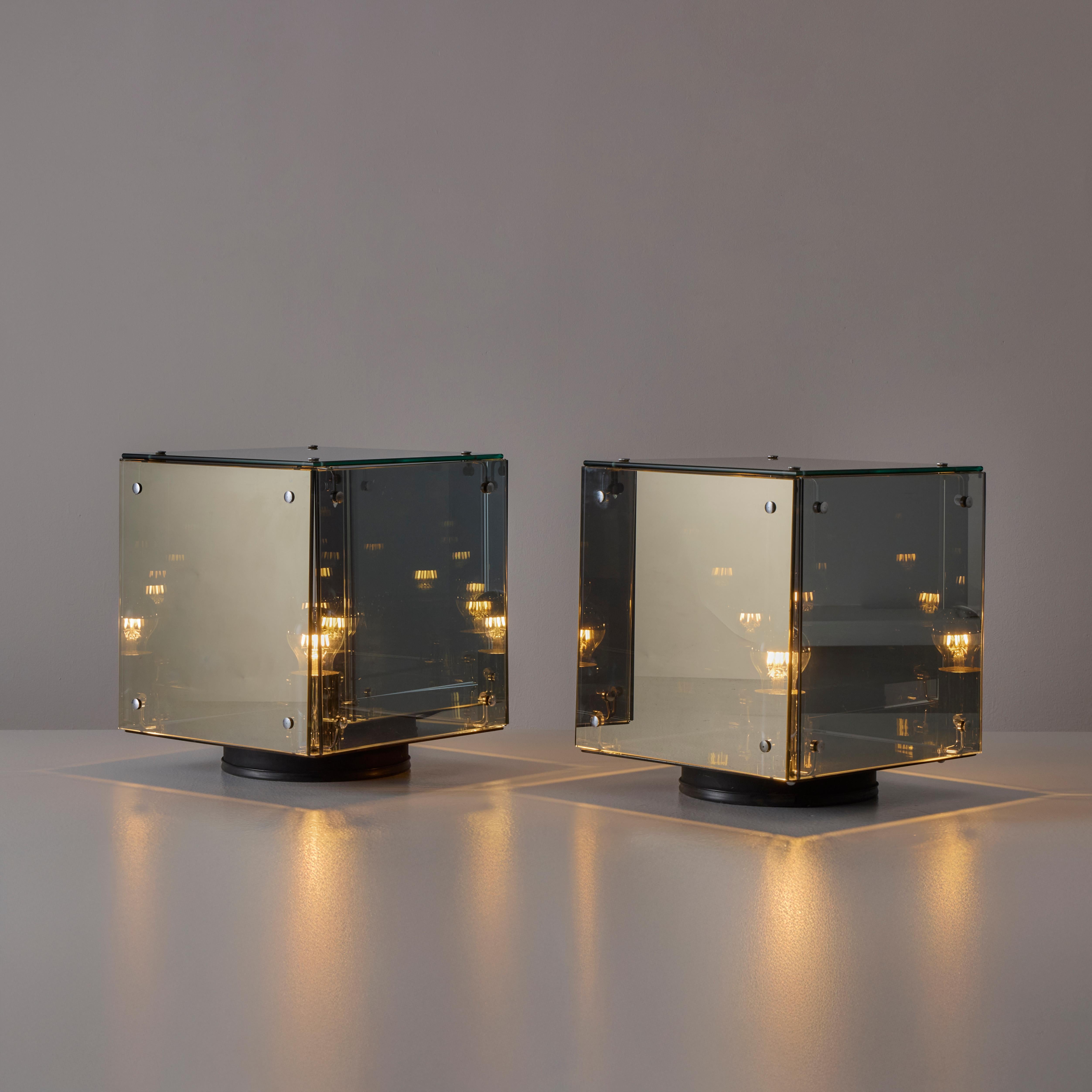 Pair of 'Prismar' Table Lamp by Studio Arditi for Nucleo Sormani. Designed and manufactured in Italy, in 1972. All-mirrored cubic table lamps with chrome details. The glass panels are mirror-like translucent, allowing you view inside the cubes, yet