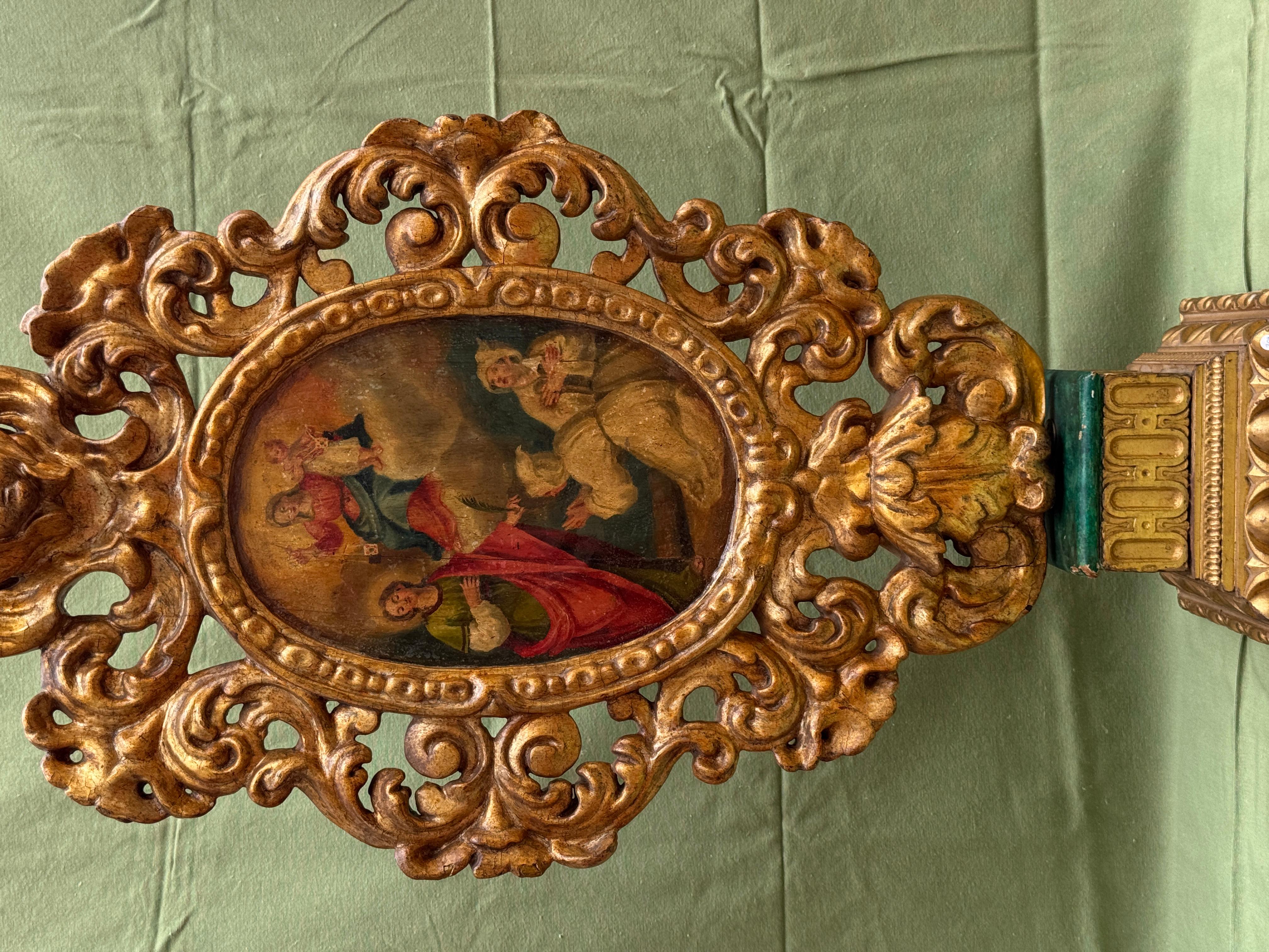 Pair of Processional Reliquaries with double-sided paintings, carved, gilded, and polychrome wood, Spanish School, 18th century, with original pedestals.

Important set consisting of two processional reliquaries in carved, gilded, and polychrome