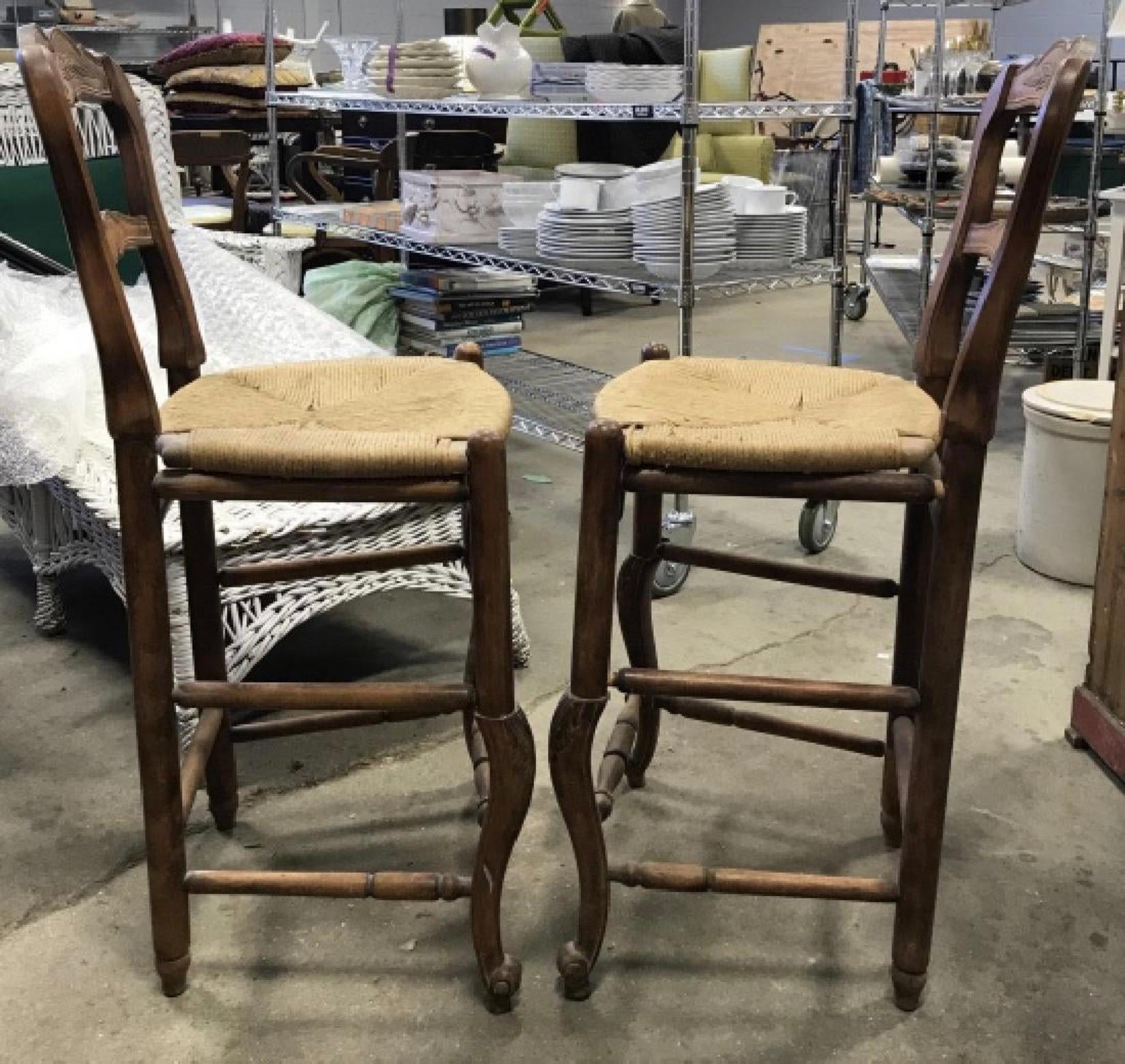 Pair of Provincial Carved Wooden Bar Stools with Rushed Seats In Good Condition For Sale In Sheffield, MA