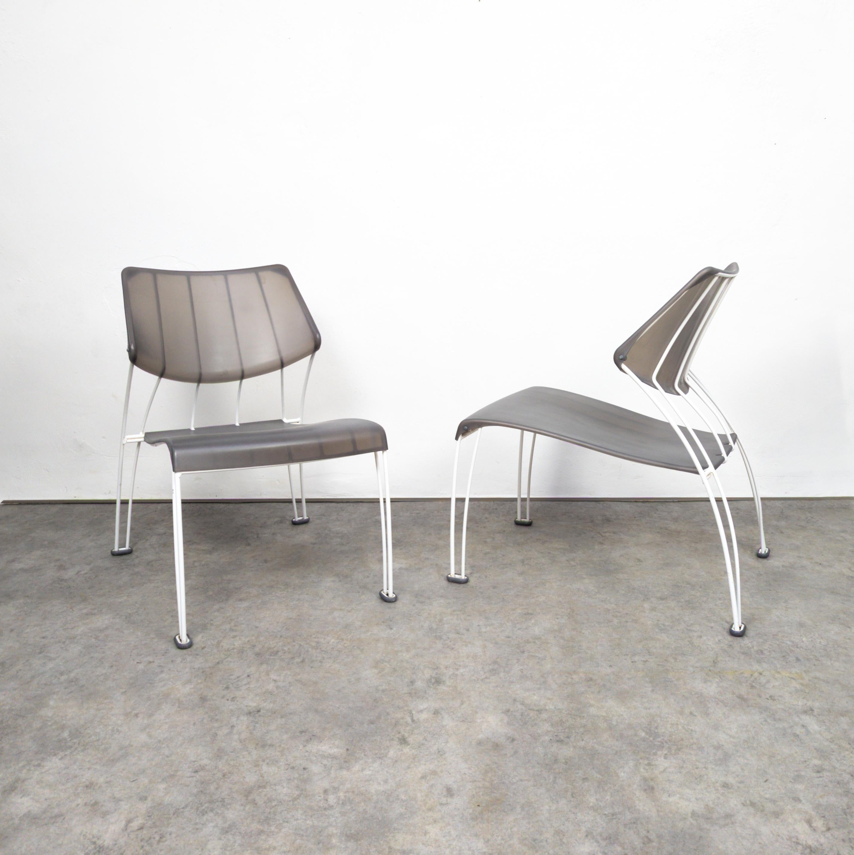 Pair of fantastic postmodern lounge chairs designed by Monika Mulder for Ikea in 1995. The Ikea PS Hässlö chairs designed by Monika Mulder are sleek and modern. They feature a minimalist design with clean lines, making them versatile for various