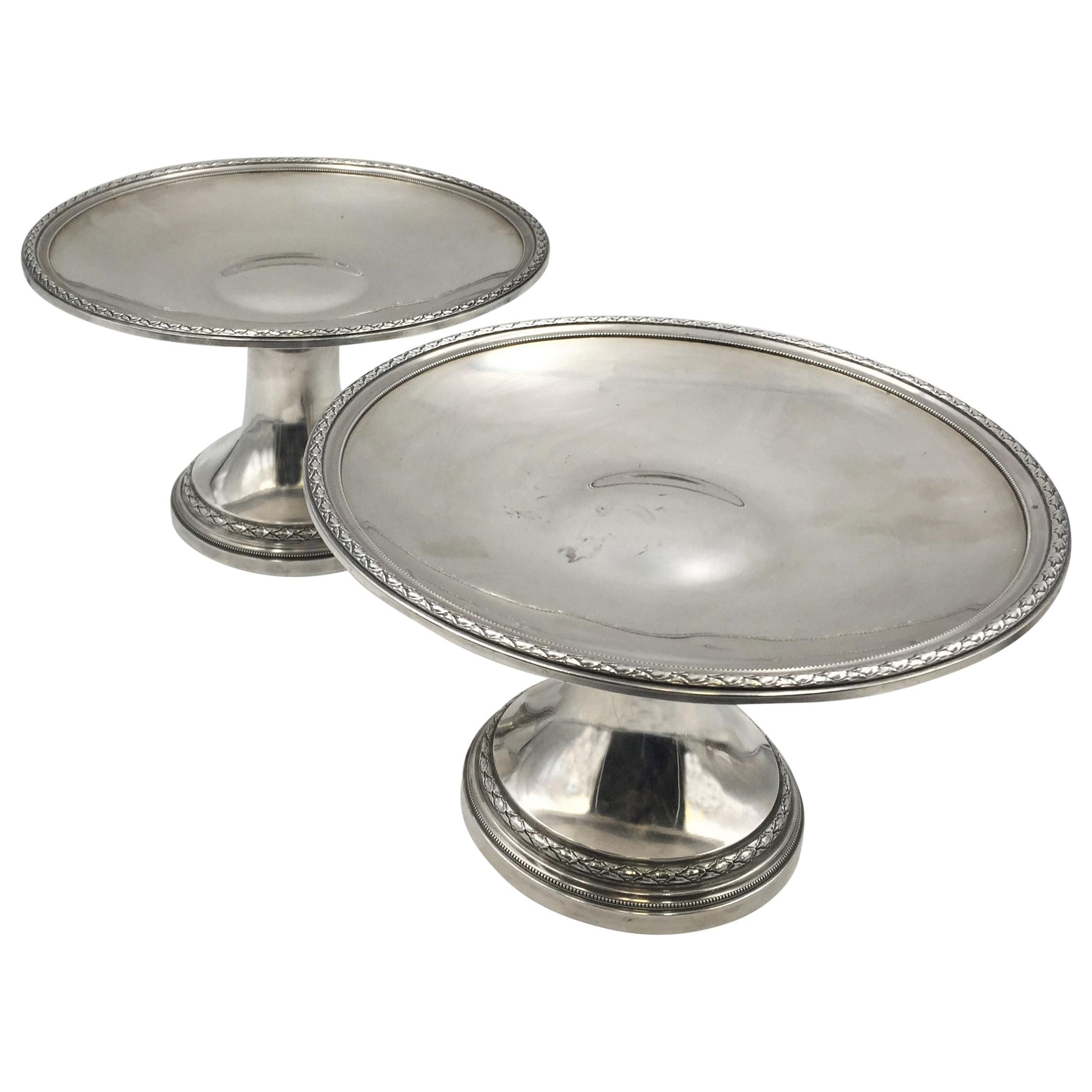 Pair of Emile Puiforcat, 19th century, French, 0.950 (higher purity than sterling) silver centerpiece stand with exquisite decorations near the rims and on the base. They measure 6'' in height by 9 1/2'' in diameter, weighs 38.4 troy ounces, and