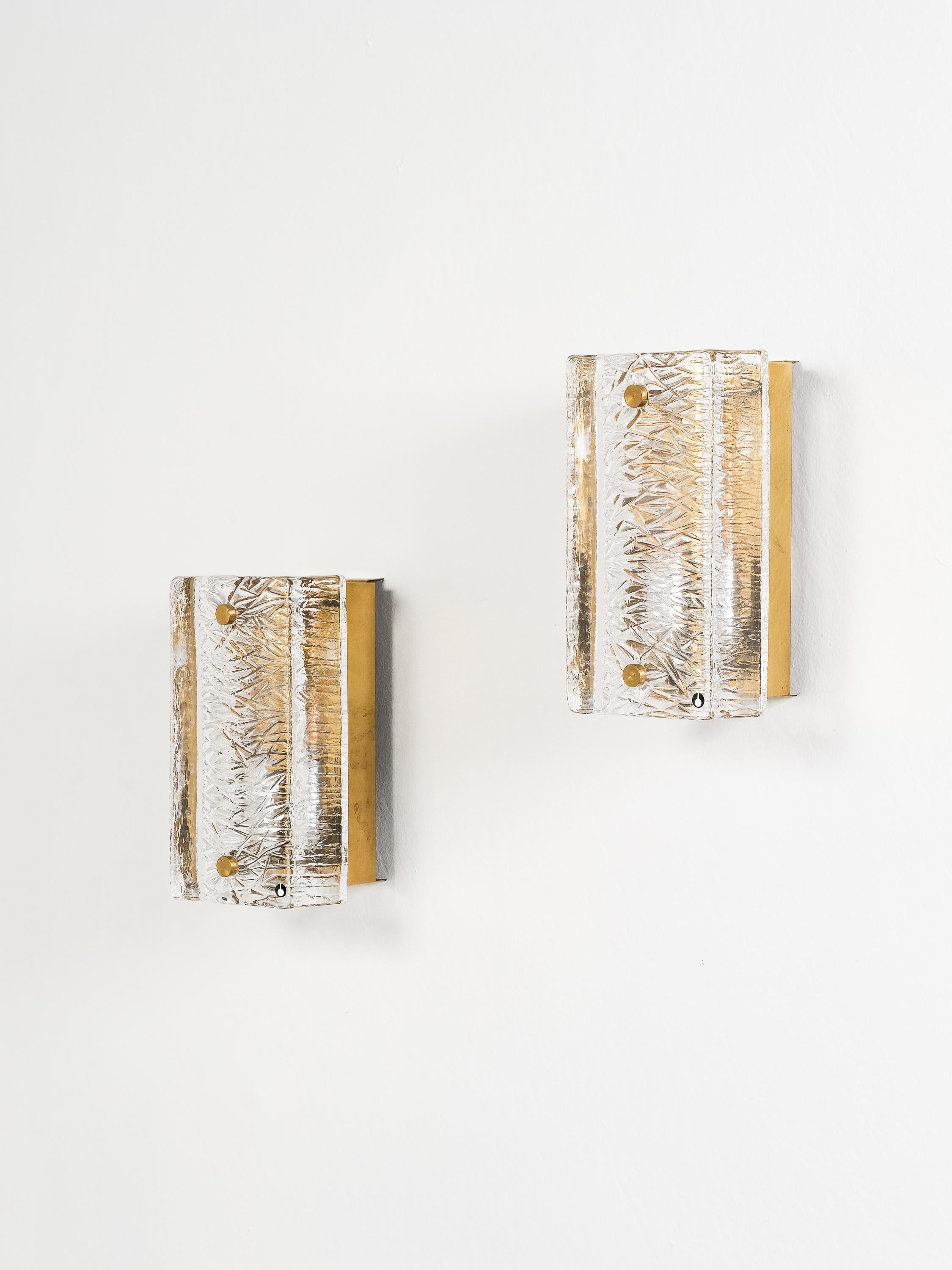 Scandinave moderne Pair of Pukeberg Brass and Crystal Glass Wall Sconces, Sweden, 1970s en vente