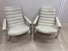 Pair of Pulkka leather Lounge chairs by Ilmari Lappalainen for Asko, circa 1960