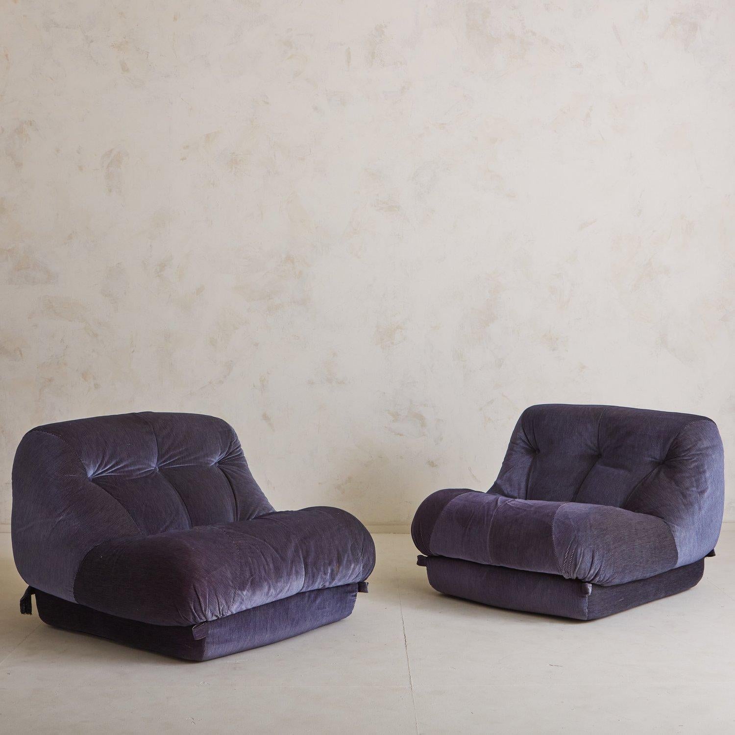 A pair of vintage Italian lounge chairs by Rino Maturi for MIMO Padova. These statement chairs feature original purple corduroy upholstery with dramatic tufting. Labeled on bottom “Mod. Depositato Nuvolone Mimo J Padova.” Sourced in Italy, 1970s.