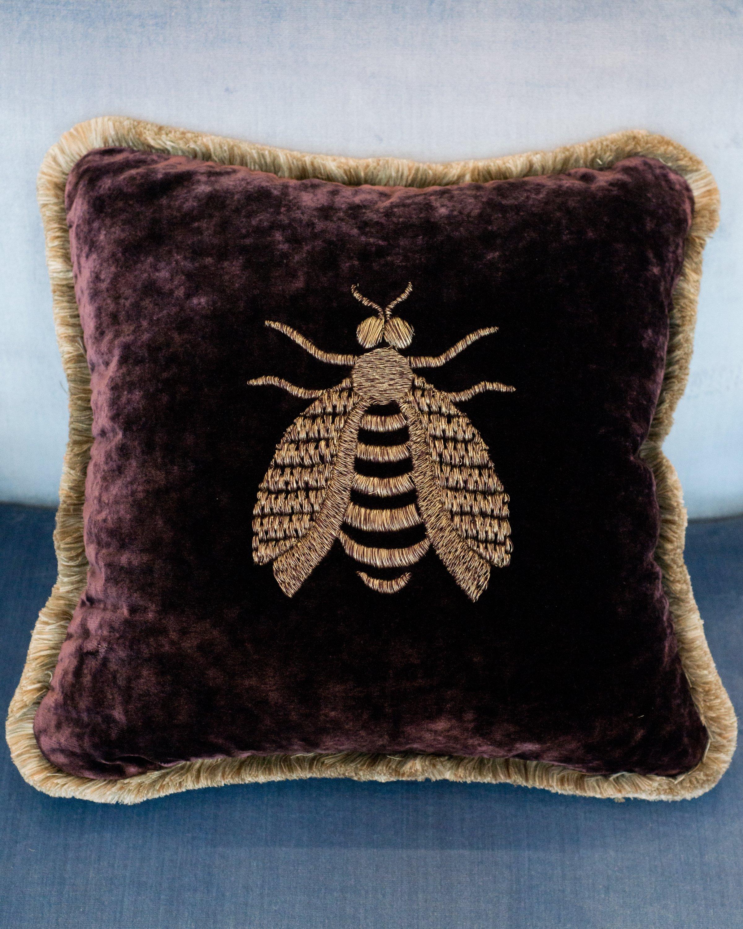 This pair of purple jewel toned, luscious velvet pillows were sourced on travels to Rome. Embroidered with a large Bee motif on the front of each pillow with gold thread. A symbol of royalty, Gucci and Dior are proud to carry the bee as one of their
