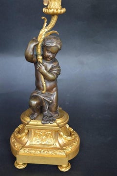 Paire de candélabres Putti en bronze