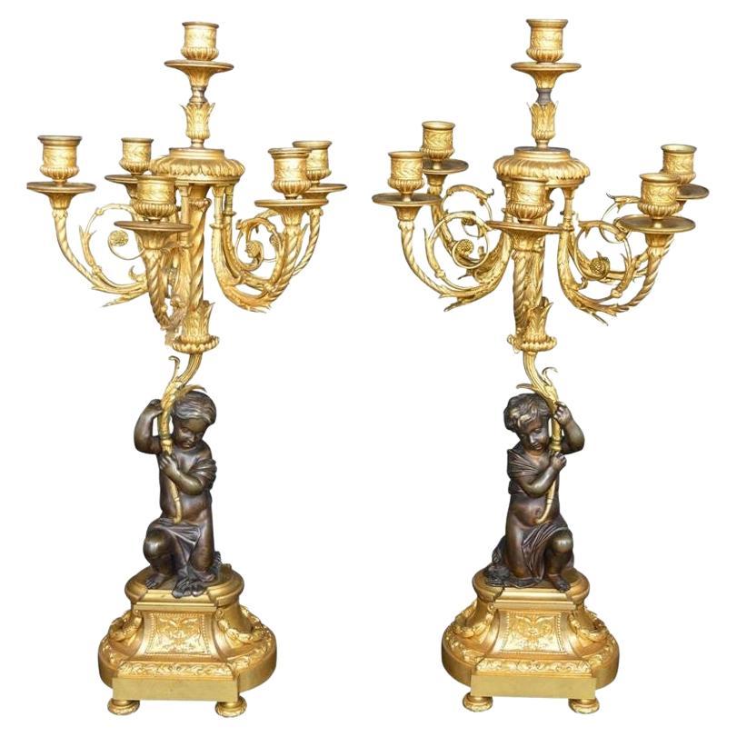 Pair of Putti Bronze Candelabras For Sale
