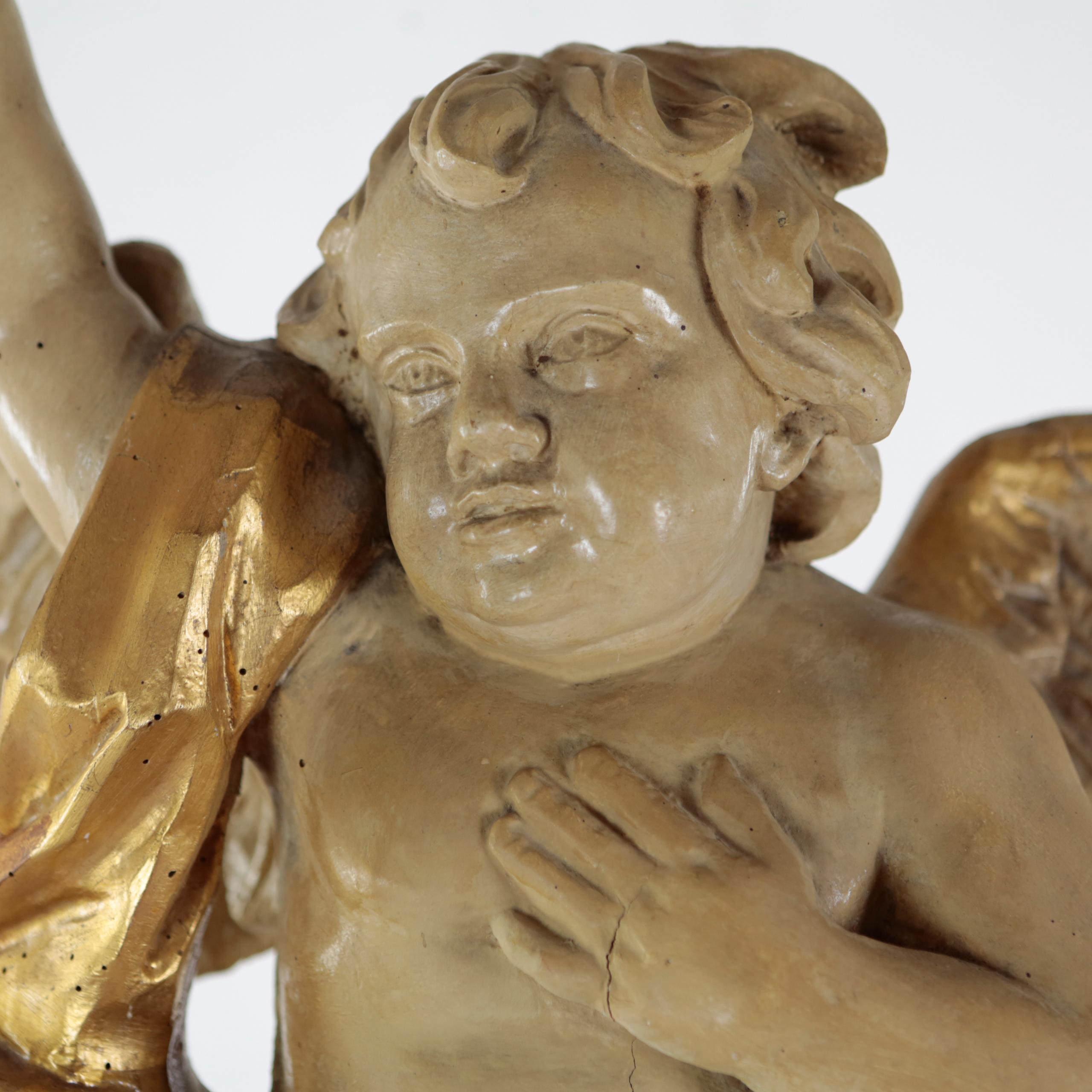 Hand-Carved Pair of Putti, Southern Germany, Lime Wood, Carved, Stuccoed and Colored, Patina For Sale