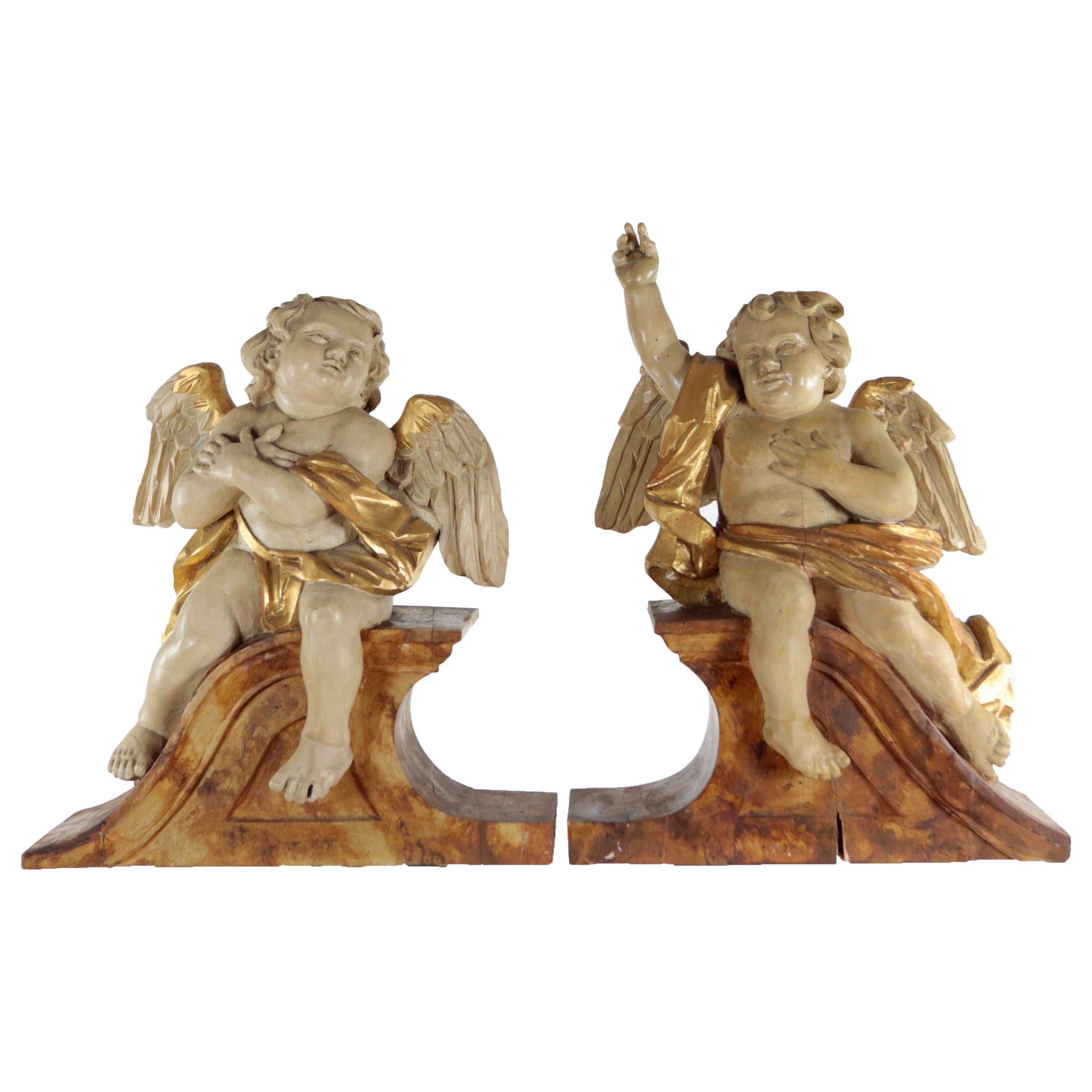 Pair of Putti, Southern Germany, Lime Wood, Carved, Stuccoed and Colored, Patina For Sale