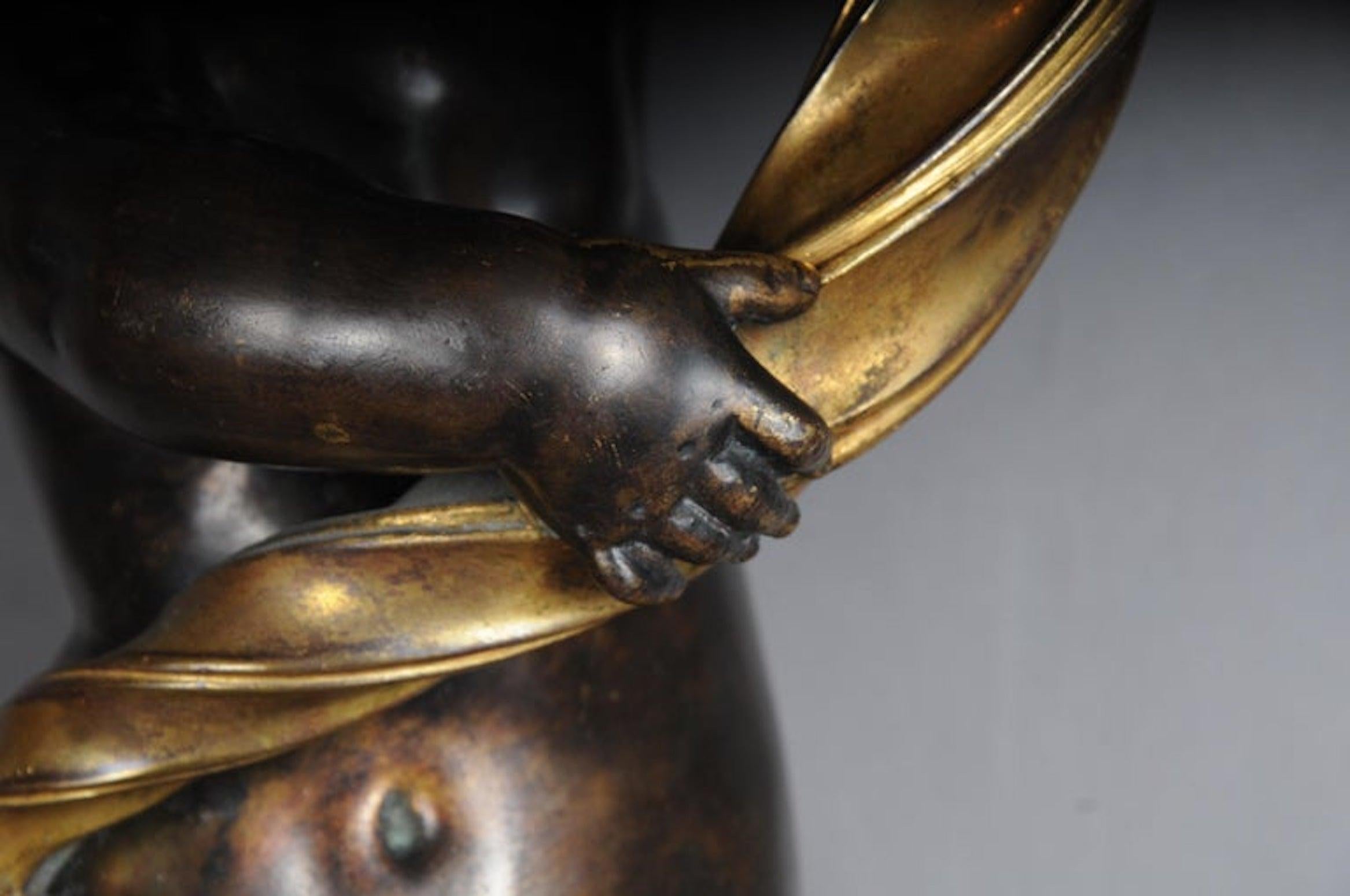 Pair of putti wall appliques or sconces, bronze gilded. Paris, 1870

Bronze patented, partially fire-gilded. Hand holding a cornucopia.
Unique pair of applique, fire-gilded. In the center a putto holding a light arm in the form of a