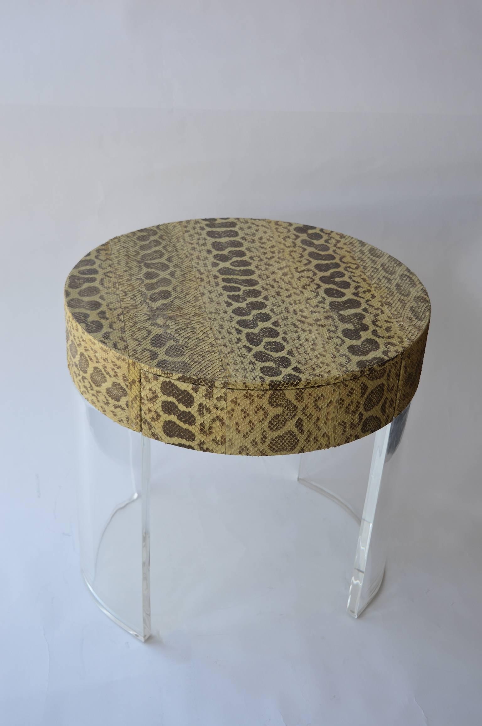 Pair of python covered side tables with drawer and acrylic legs.
