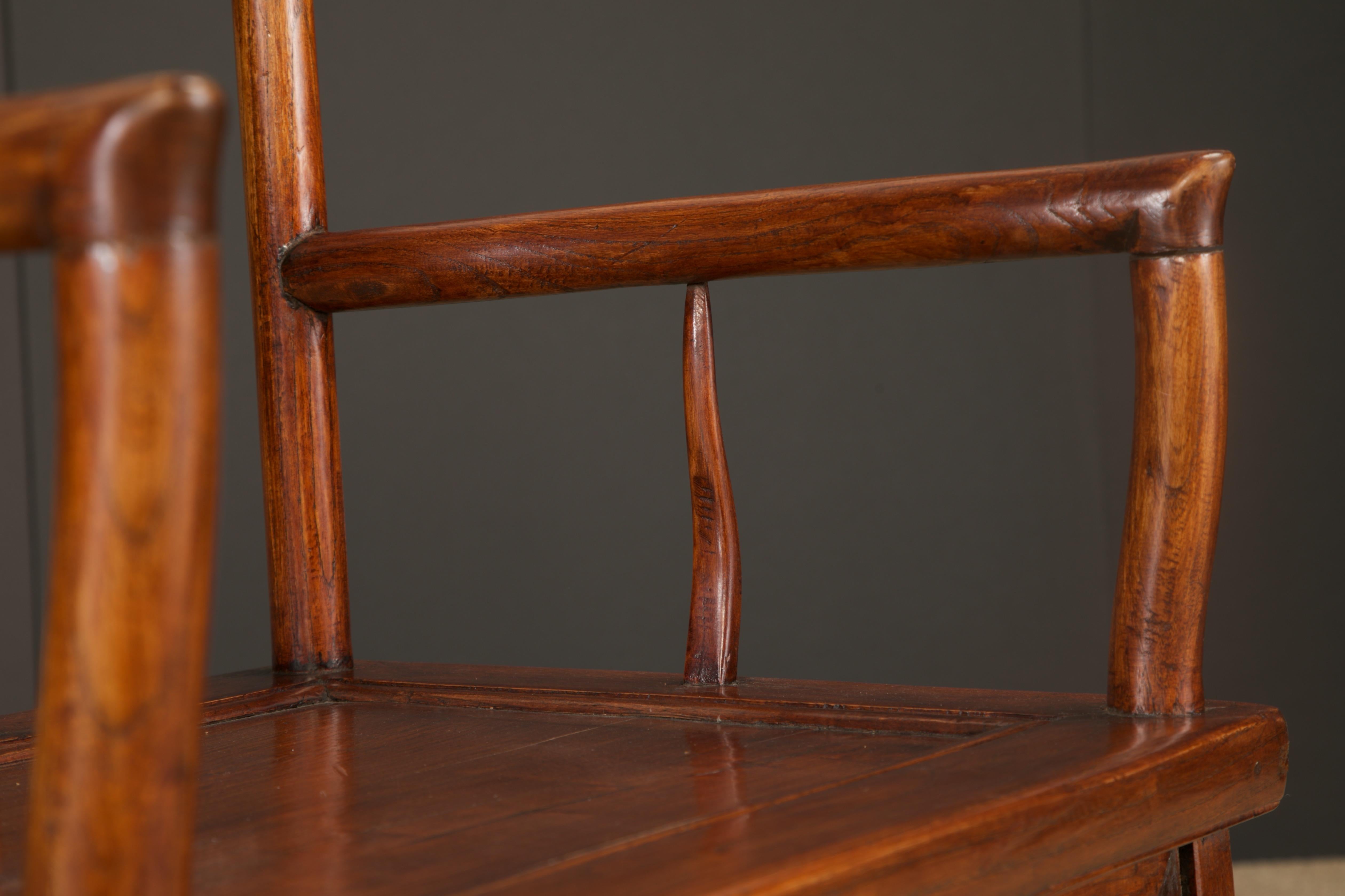 Pair of Qing Dynasty Chinese Horseshoe-Back Armchairs in Carved Elmwood For Sale 10