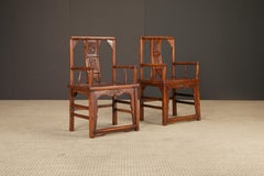 Pair of Qing Dynasty Chinese Horseshoe-Back Armchairs in Carved Elmwood