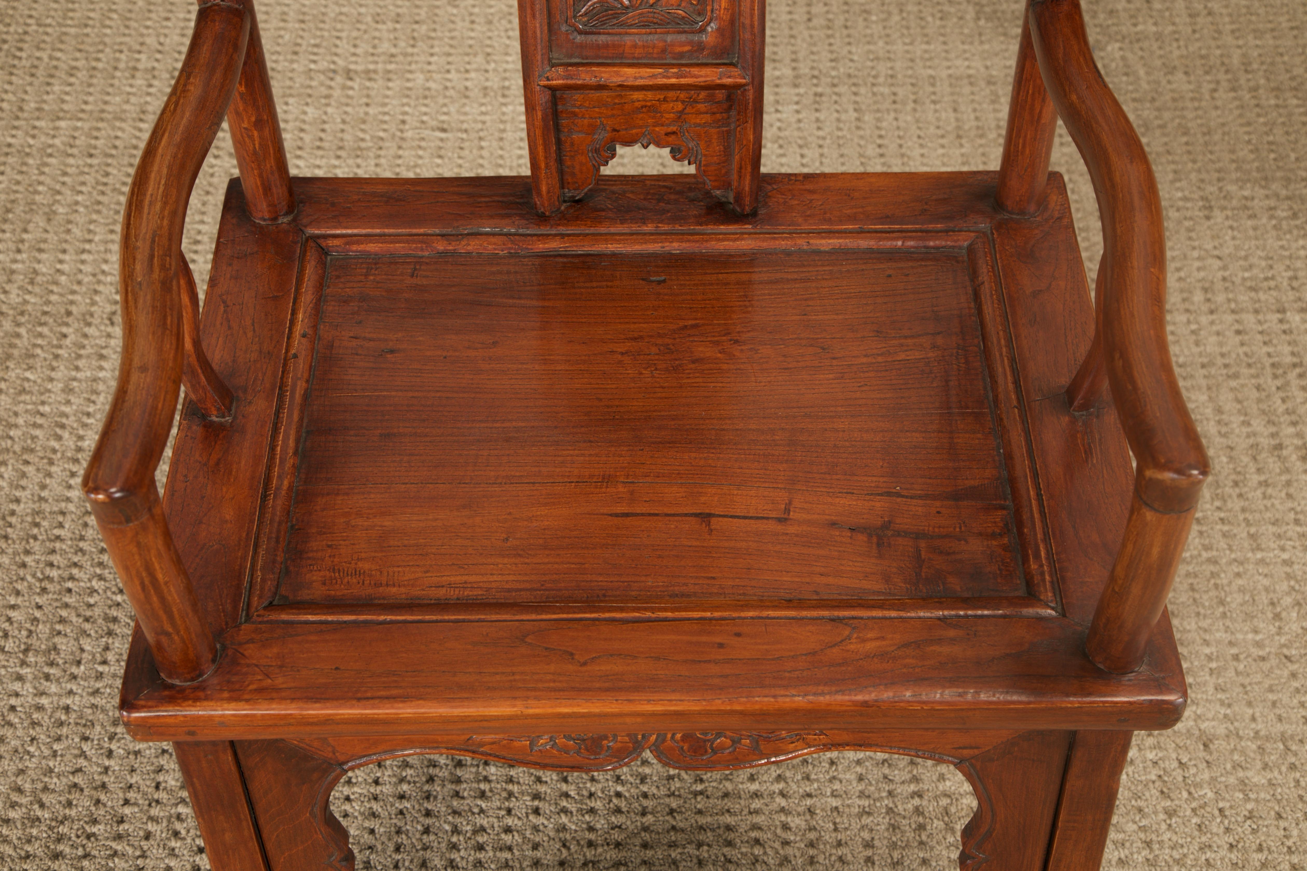 Pair of Qing Dynasty Chinese Horseshoe-Back Armchairs in Carved Elmwood For Sale 3