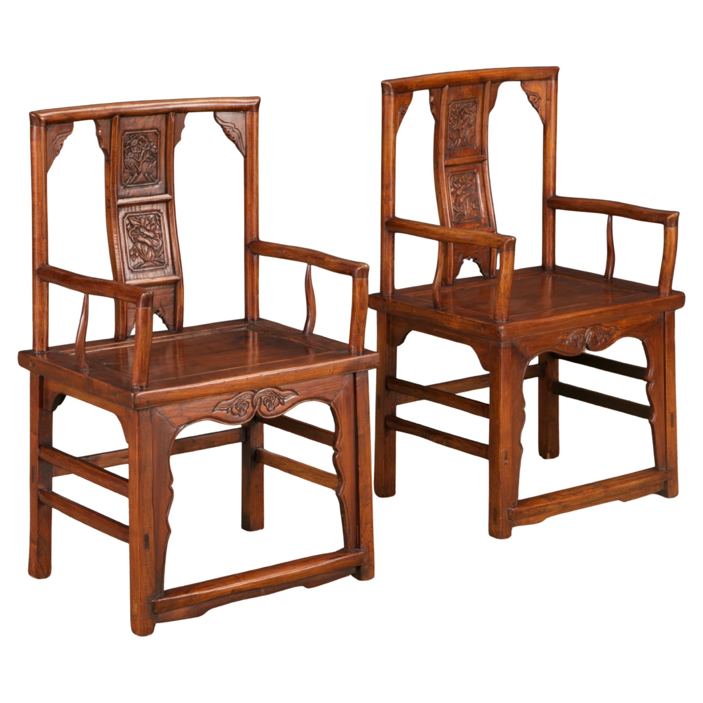 Pair of Qing Dynasty Chinese Horseshoe-Back Armchairs in Carved Elmwood For Sale