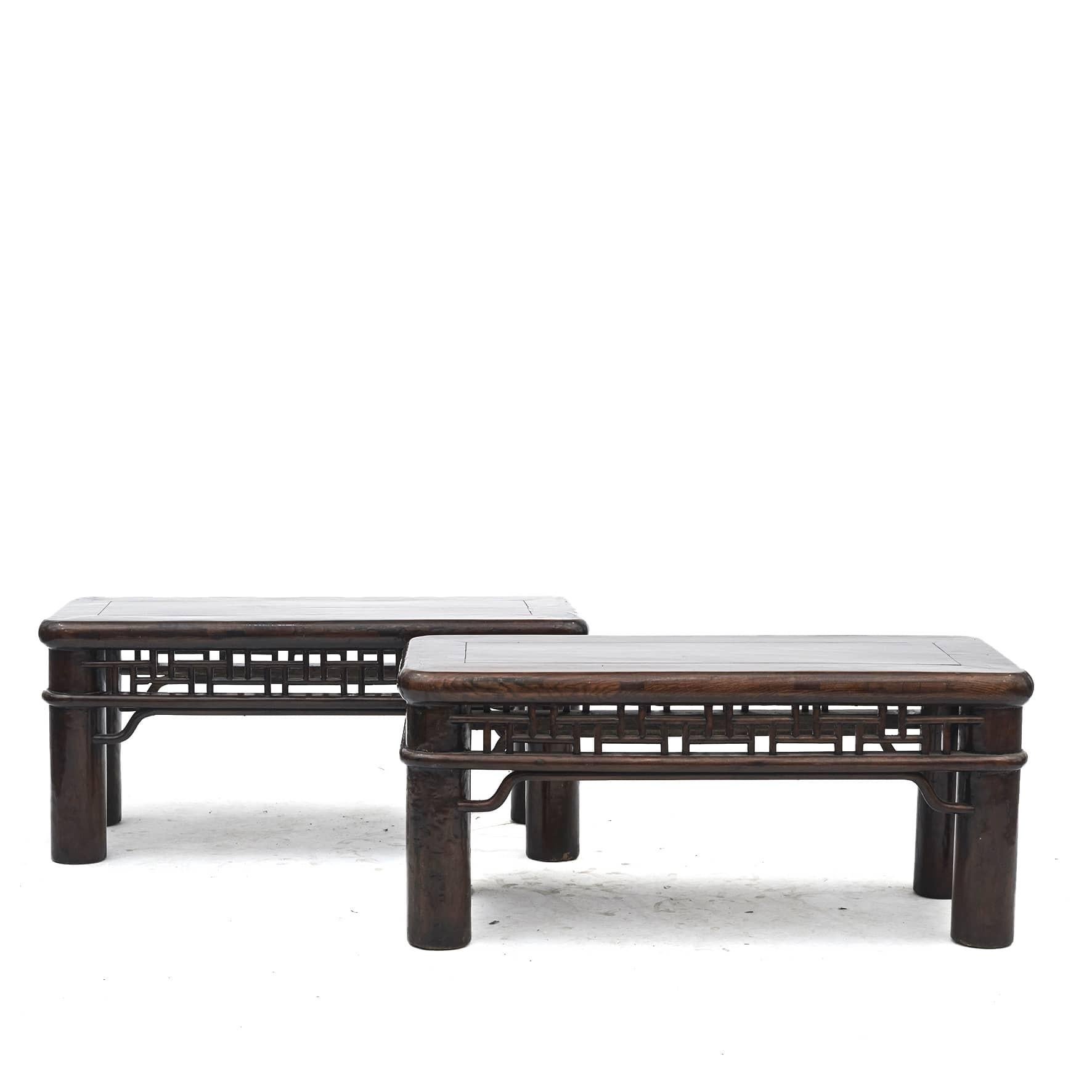 Pair of tables or benches in elm wood.
Stylish and architectural designed with a strong frame in in good quality. Can be used as a table, a low console or a bench.
Natural patina with clear lacquer coat finish.
Shanxi Province, 1950-1870.

Can