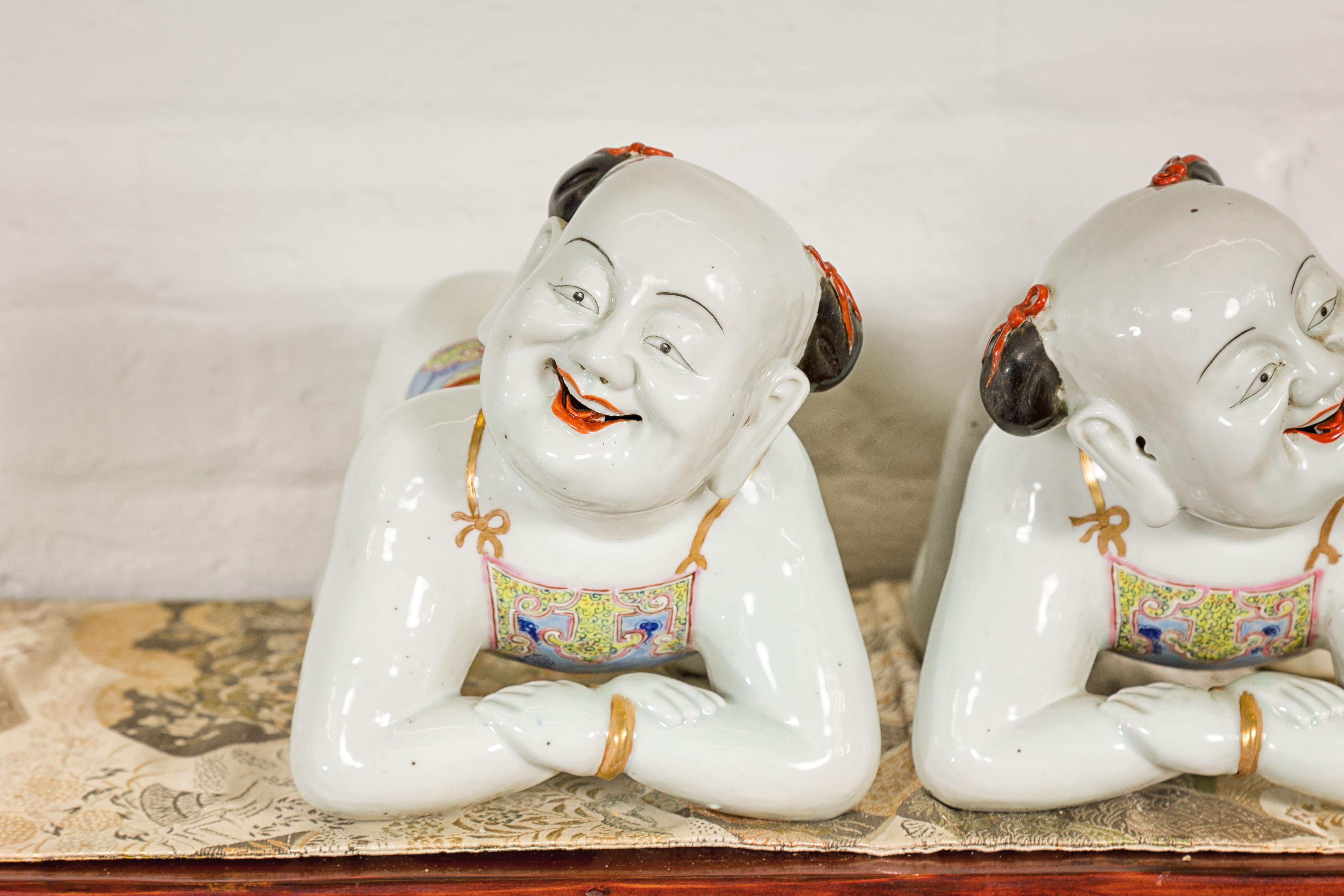 Pair of Qing Dynasty Period Porcelain Tong'zi Pillows Depicting Kneeling Boys For Sale 1