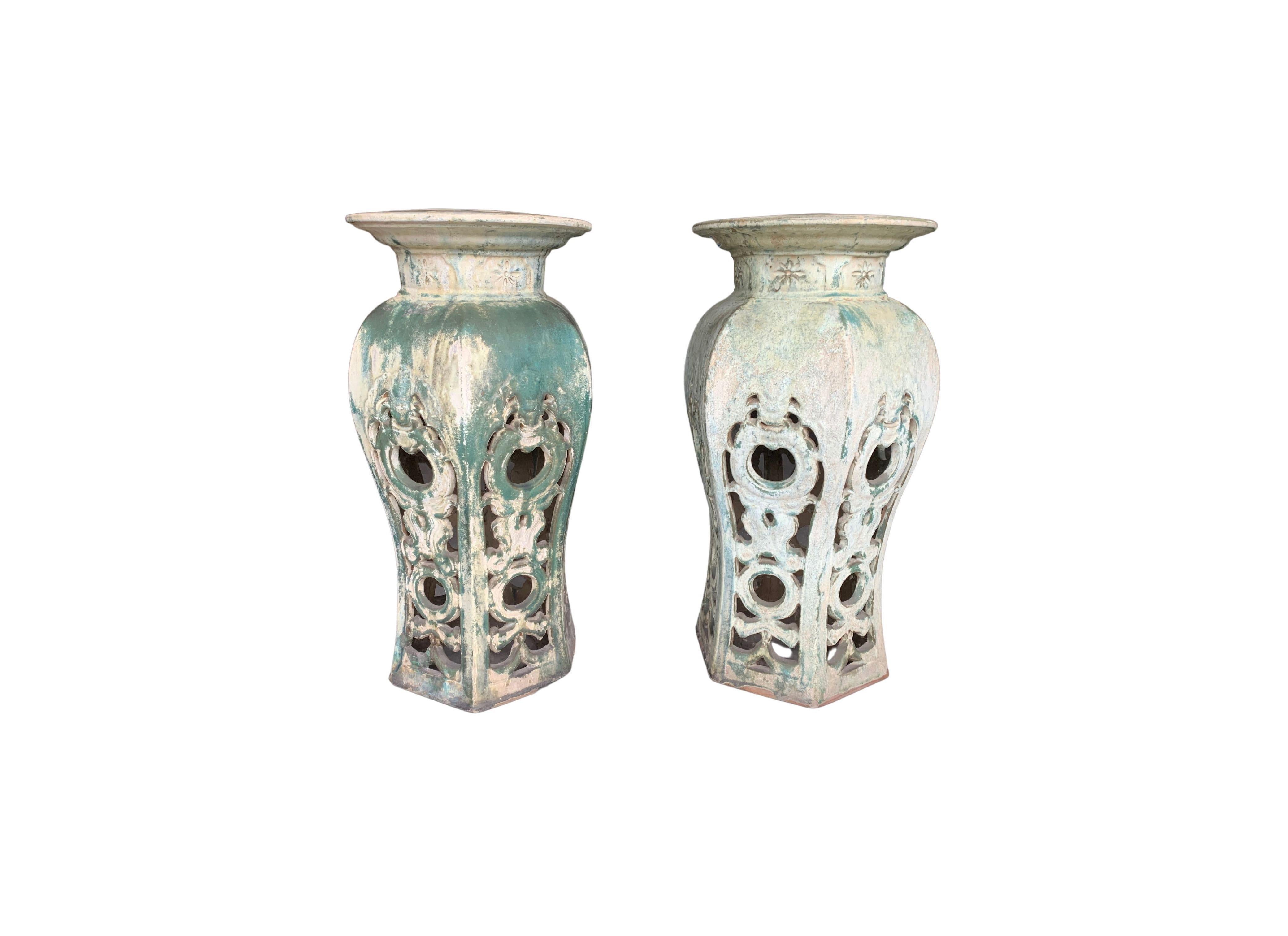 This pair of early 20th century Pedestals feature a wonderful age-related faded green finish. They feature a hexagonal base and largely hollow centre allowing them to remain relatively light yet robust. A perfect item to display special urns,