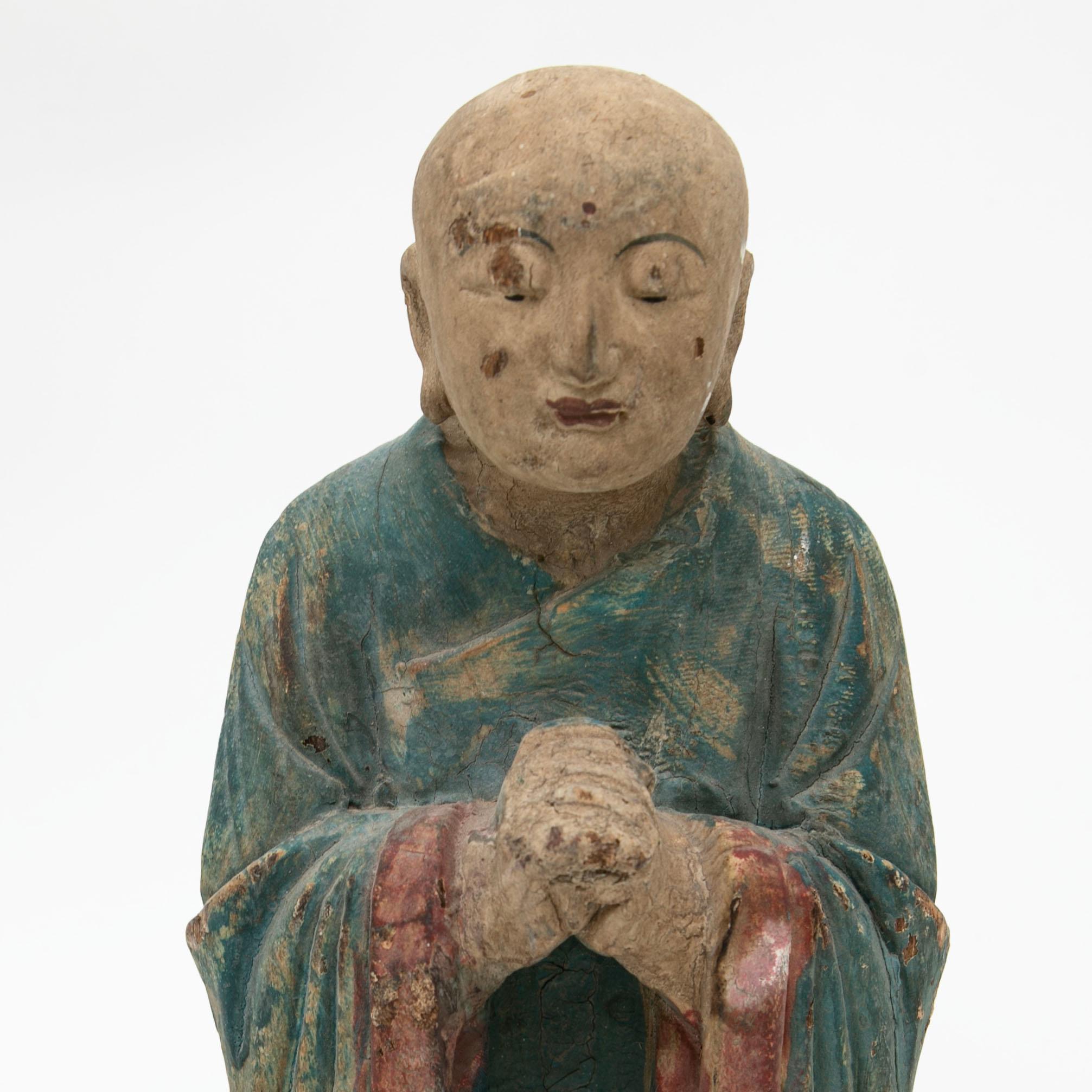 Pareja de monjes orantes tibetanos tallados en madera de la dinastía Qing Madera en venta