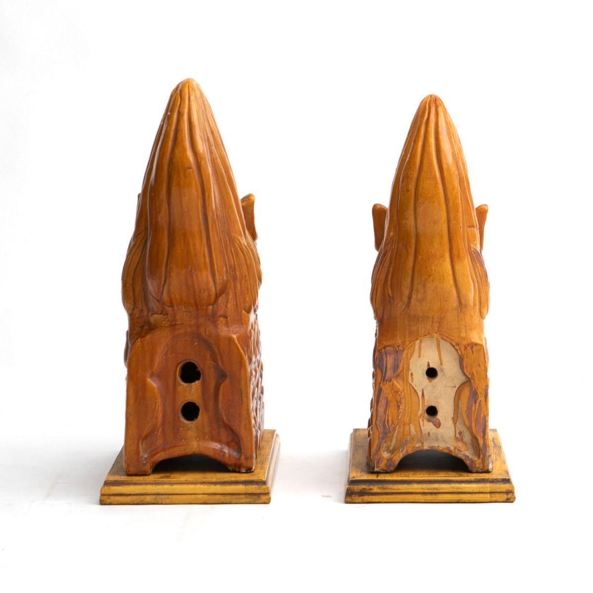Chinese Pair of Qing Dynasty Yellow-Glazed Ceramic Roof Lions