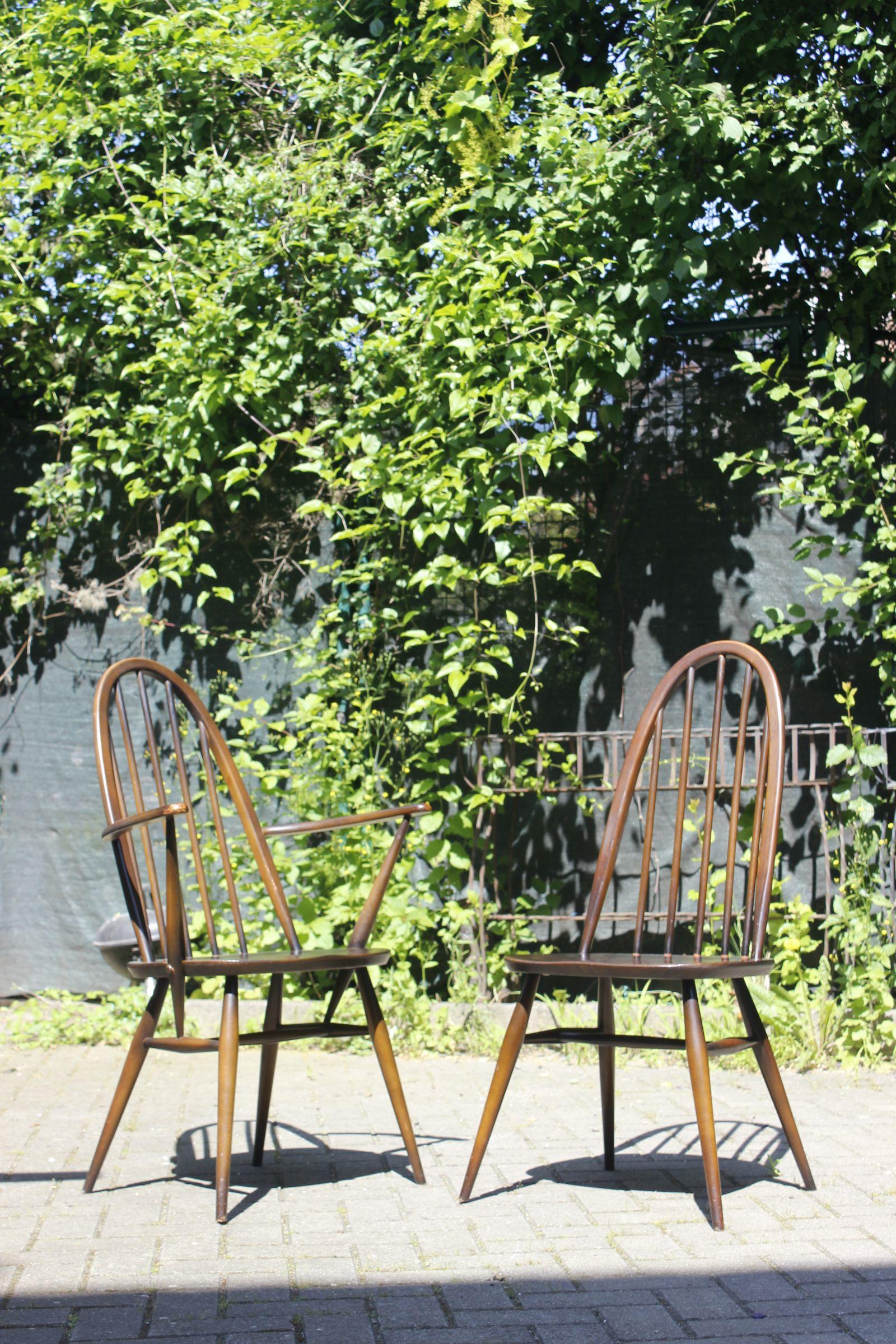 Set of one chair and one armchair, Quaker inspired design by Lucian Ercolani for Ercol, England 1960s. 

In good condition, there is no damage to the wood, marks on the stain. Both chairs are signed. 