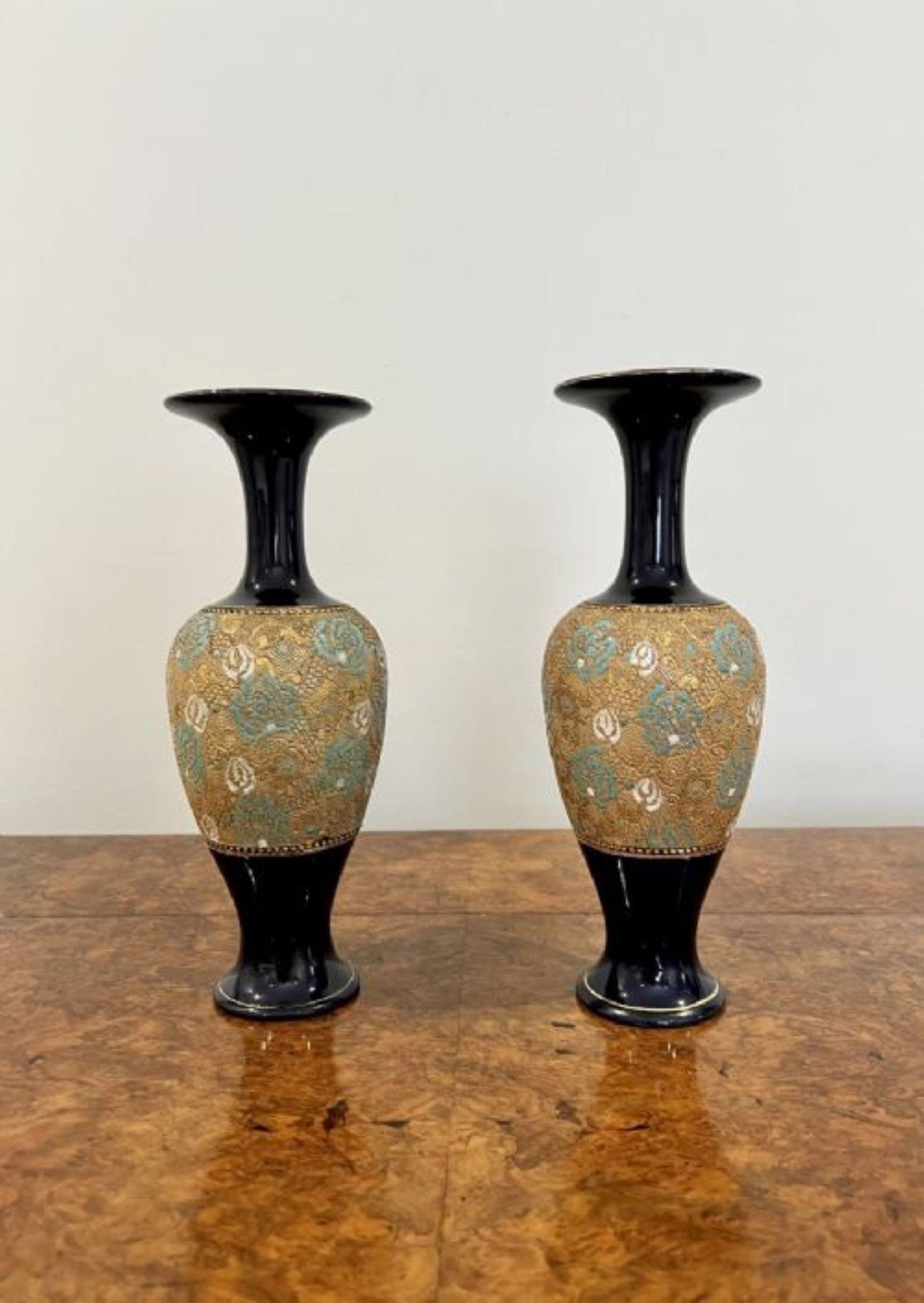 Pair of quality antique Victorian Doulton vases having a quality pair of Doulton shaped vases with wonderful blue and gold colours to the neck of the vases, fabulous embossed flowers to the center with hand painted detail in wonderful blue, white