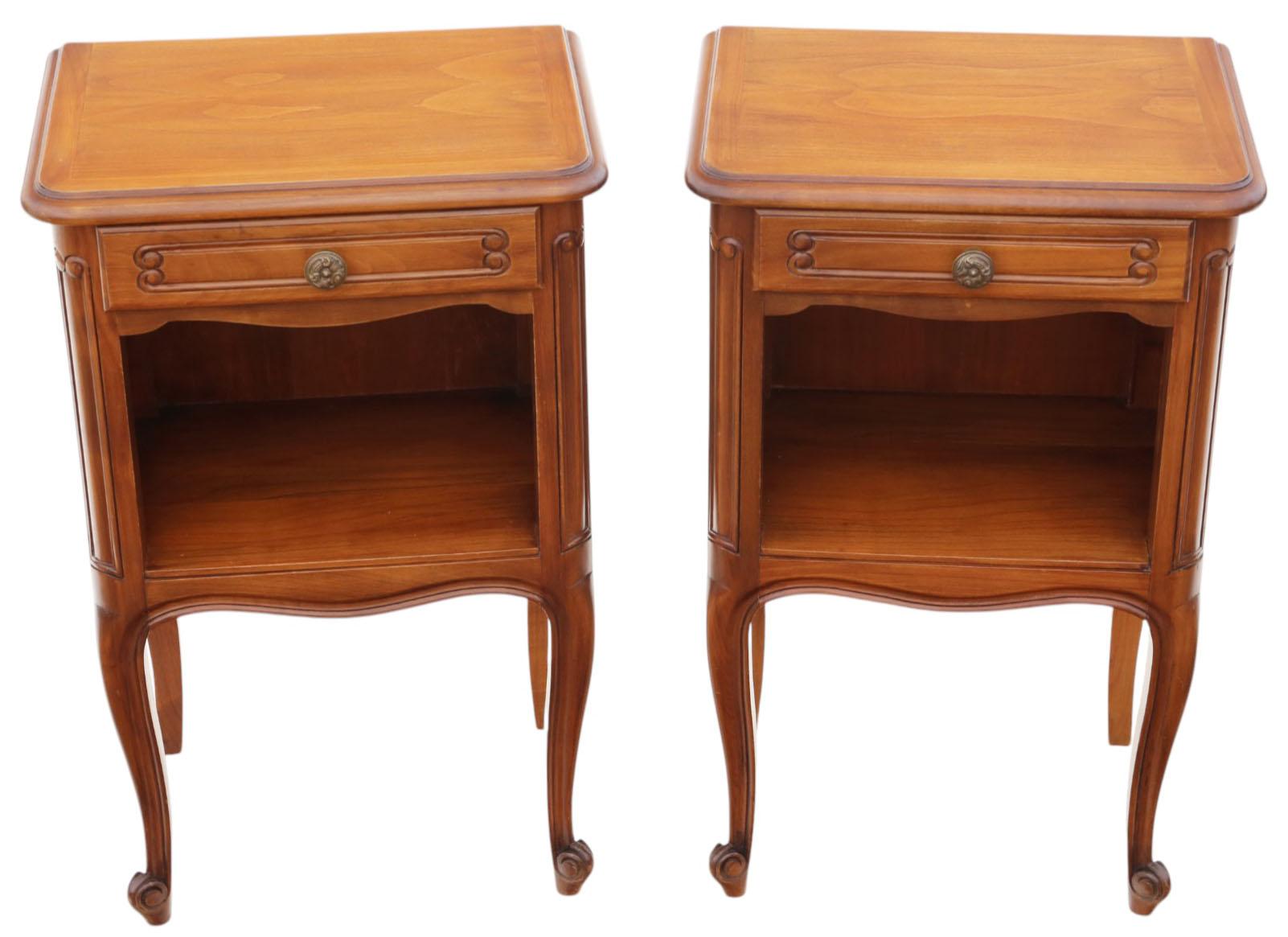 Pair of Vintage Mid-Century Cherry or Walnut Bedside Tables – 20th Century Nightstands or Side Tables

This attractive pair of vintage mid-century bedside tables, crafted from either cherry or walnut, features clean lines, warm timber tones, and a