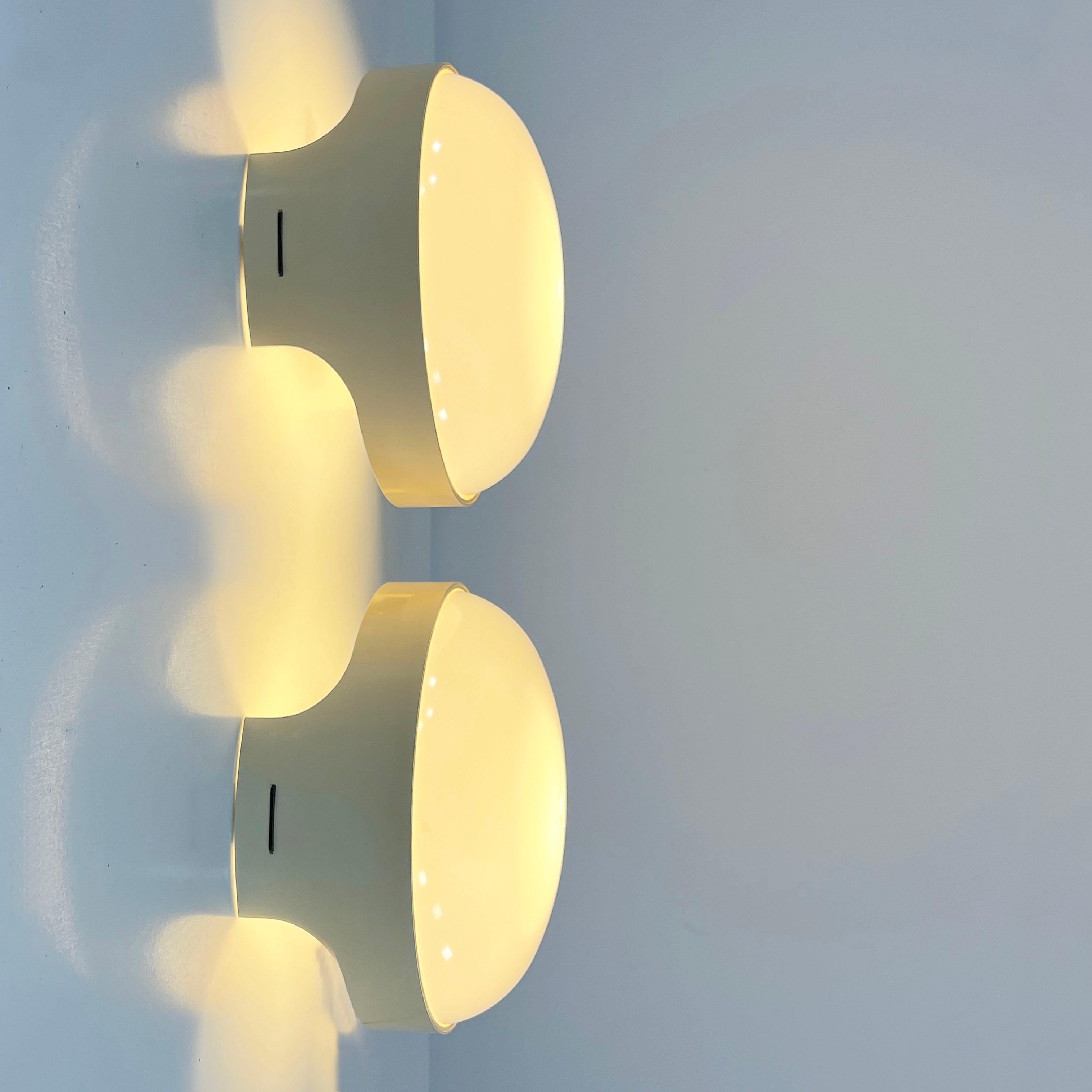 Designer - Joe Colombo
Producer - Kartell
Model - Quattro KD 4335 Wall Lamp 
Design Period - Sixties
Measurements - Width 25 cm x Depth 25 cm x Height 14 cm
Materials - Plastic
Color - White/Beige
Electrical Properties - Lightbulb E14
Comments -