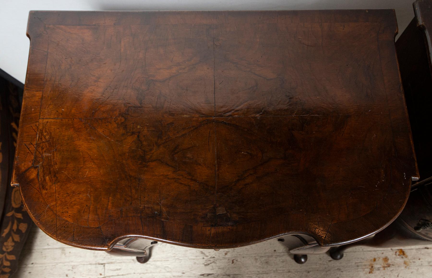 A matched pair of side tables or low boys. One long drawer with 2 smaller drawers below on the left and right sides. Brass drop pulls. Cabriole legs ending in pad feet. Shaped apron. 
Please note that  all purchases  must  be completed  by  May 31,