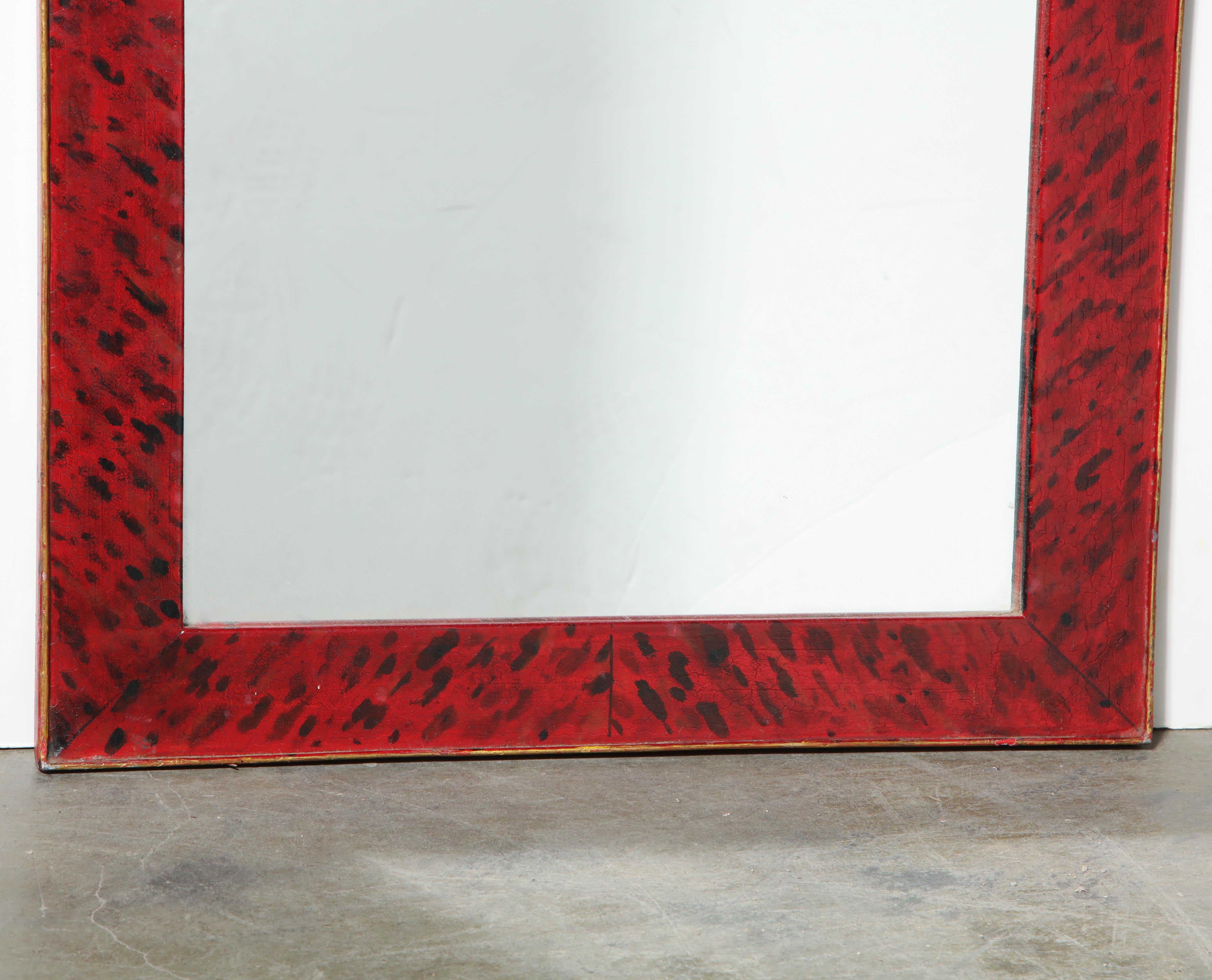 Pair of Queen Anne style faux tortoise shell painted arched top metal mirrors.