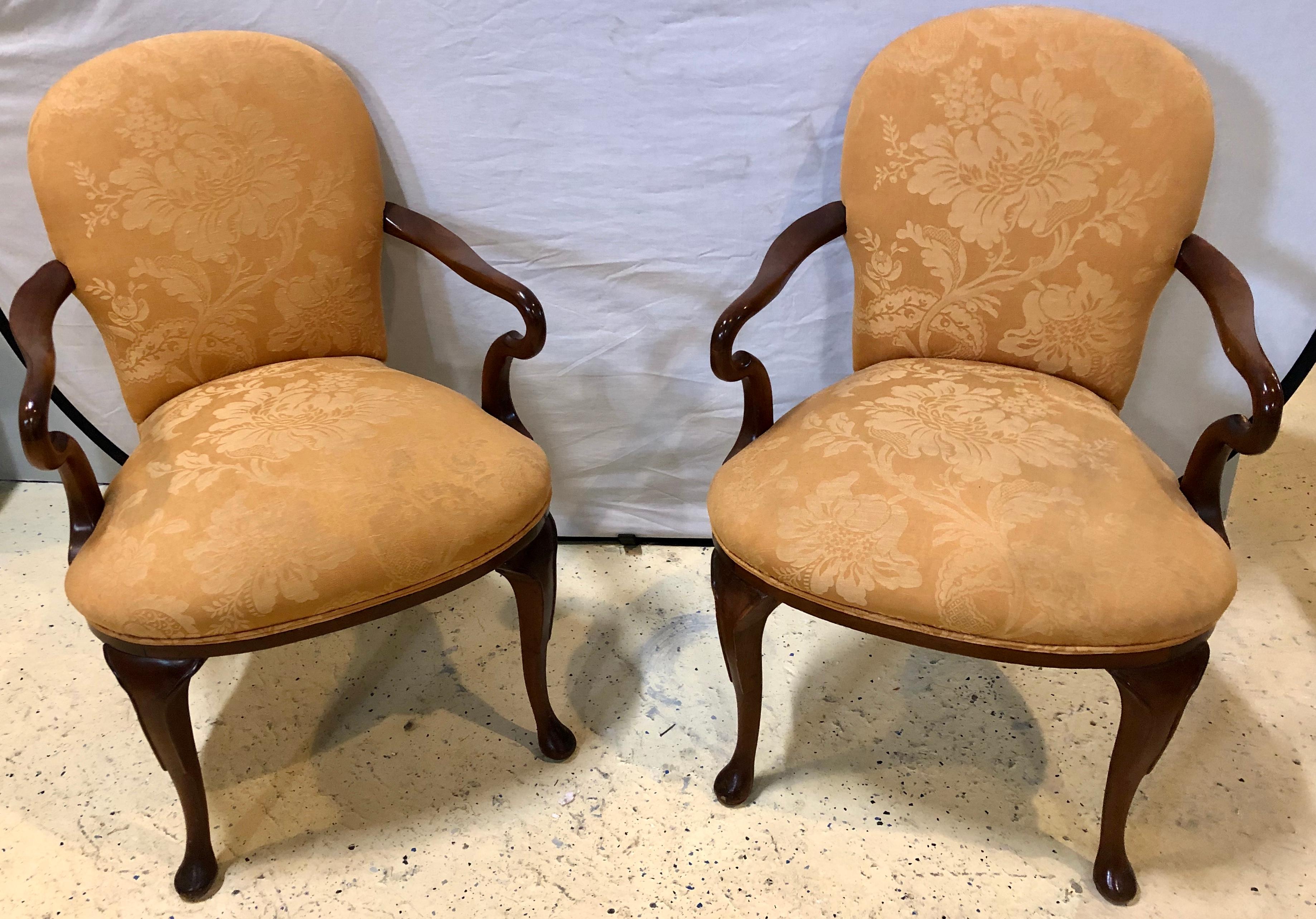 Pair of Queen Anne style open armchairs or bergeres. Having clean sleek and simple form are this stylish arm, office or desk chairs having a lovely upholstery. Nice large seats and backrests.