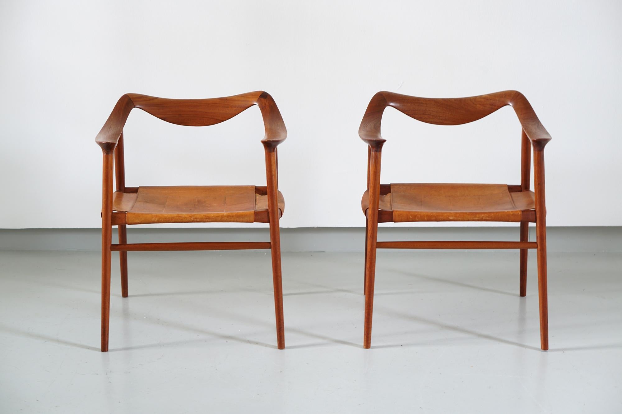 A beautiful pair of exceptional and rare armchairs, model Bambi designed by Rolf Rastad and Adolf Relling. Produced by Gustav Bahus and Eft, Os, Norway, 1955.
The Bambi armchair is regarded as one of the most elegant and artistic chairs designed