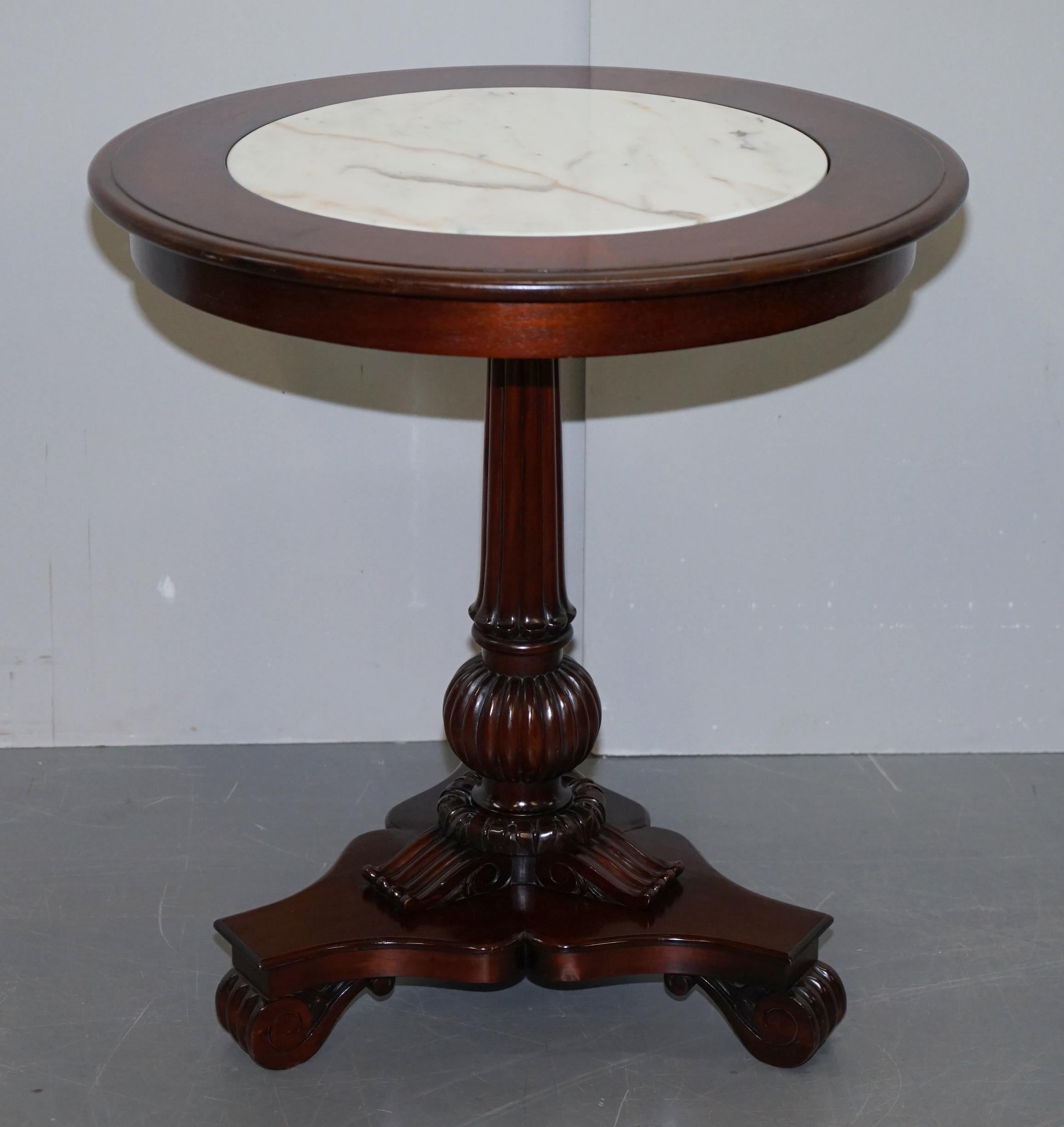 We are delighted to offer for sale this lovely pair of ex-showroom Ralph Lauren American mahogany with inset Italian marble tops, large side or occasional tables

A very good looking, well made and decorative pair, ideally suited as large lamp