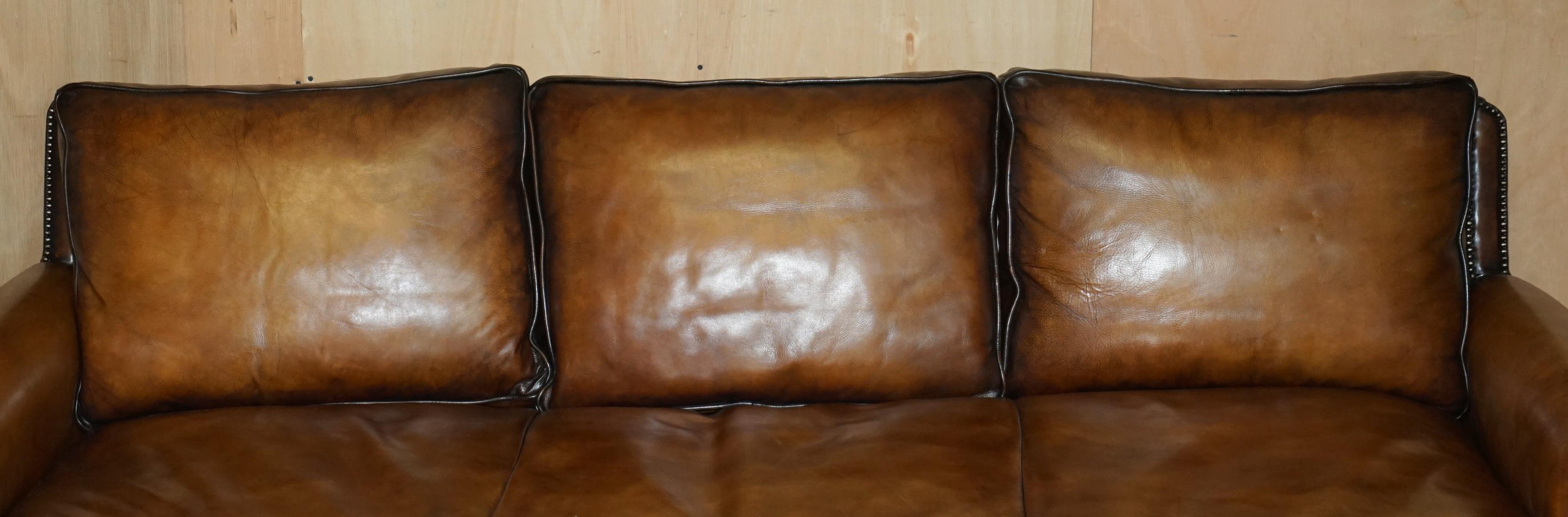 Leather PAIR OF RALPH LAUREN ARAN ISLES CUSTOM MADE BROWN LEATHER SOFAs