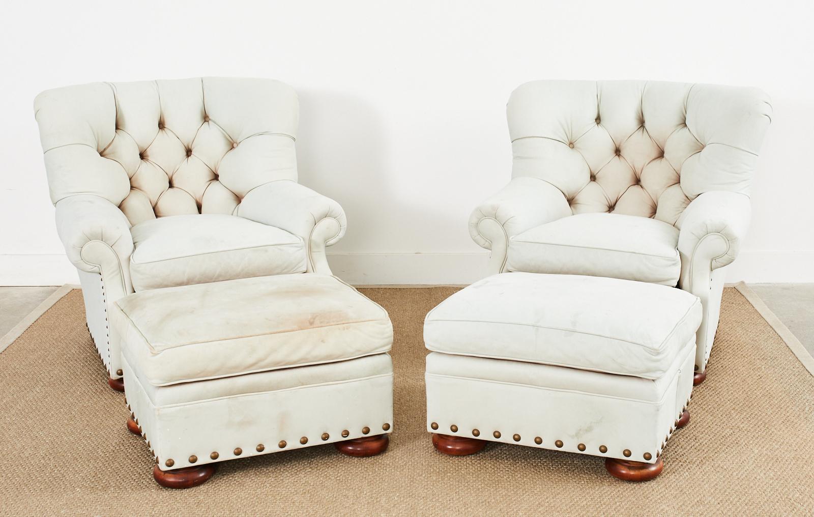 Beautifully weathered pair of leather writers chairs or wingback chairs made in the style and manner of Ralph Lauren. The large wing chairs are crafted from thick, glove-soft tufted leather hides with a desirable worn patina. The finish is faded,