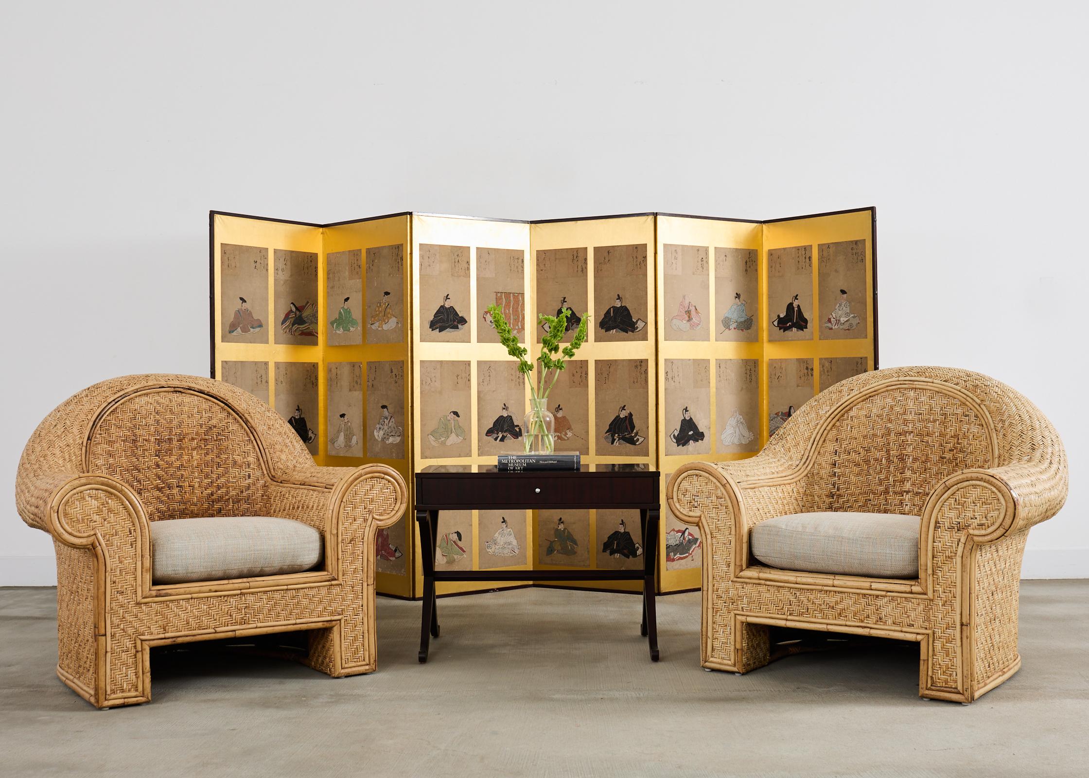 Gorgeous pair of oversized organic modern fan back lounge chairs featuring a woven seagrass style of rattan wicker produced by O-Asian in California for Ralph Lauren Home. These chairs were designed in the 20th century for Bloomingdale's by Ralph