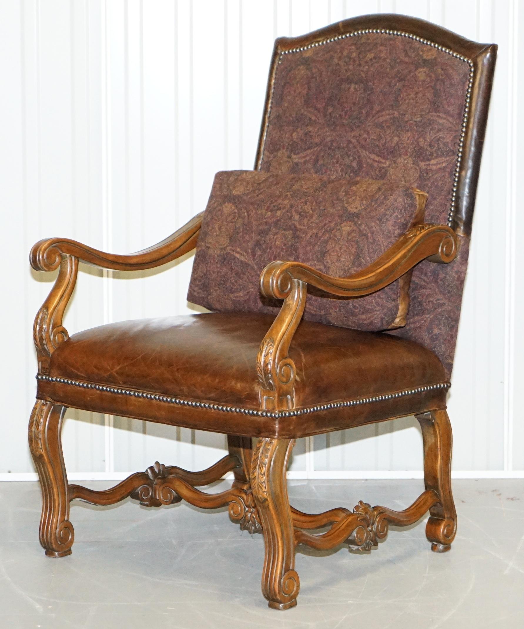 We are delighted to offer for sale this absolutely stunning pair of Ralph Lauren Edmund throne heritage brown leather armchairs

A very good looking and well made pair, each chair has its own feather filled lumbar cushion, brown leather on one
