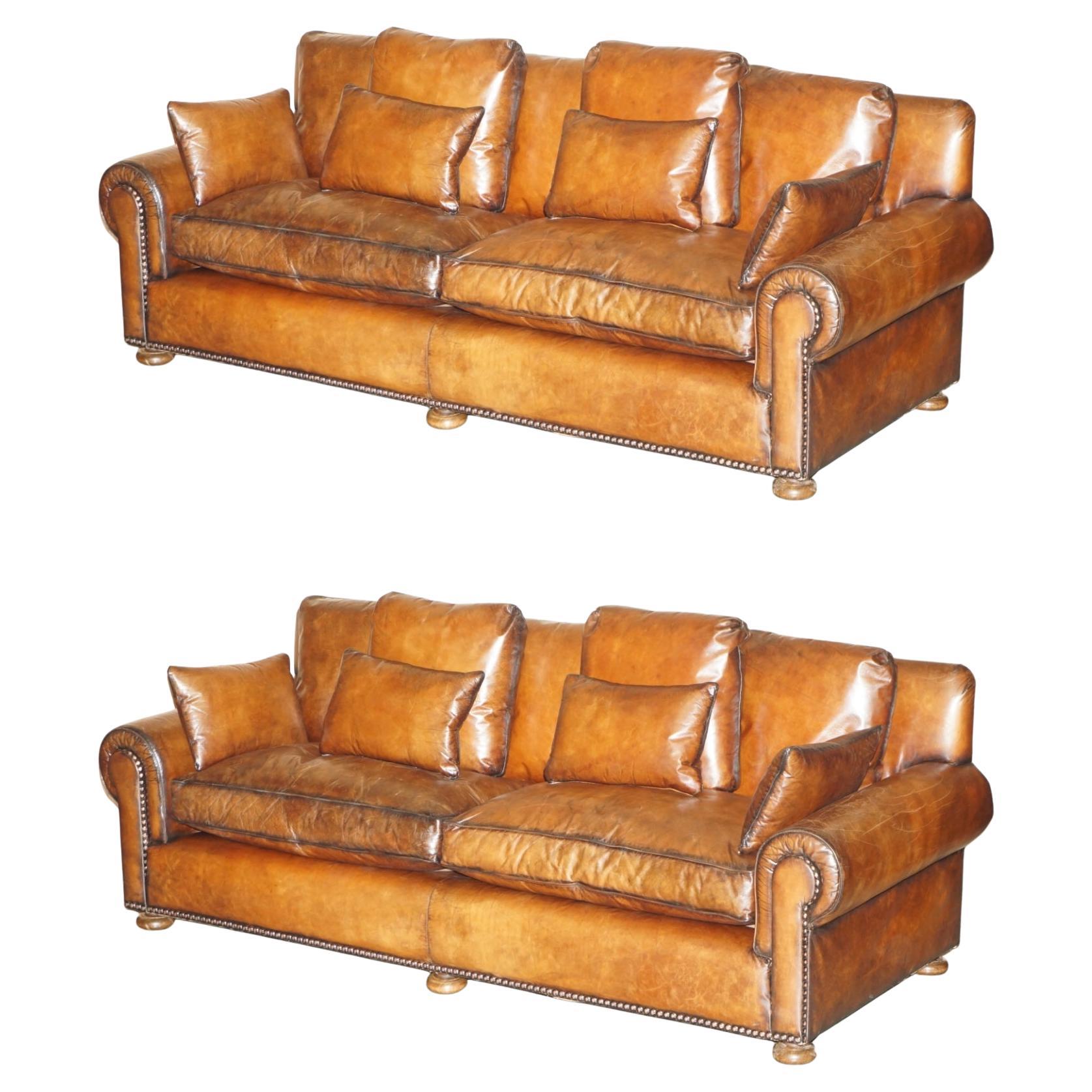 PAIR OF RALPH LAUREN JAMAICA RESTORED HERITAGE BROWN LEATHER SOFAs