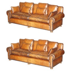 PAIR OF RALPH LAUREN JAMAICA RESTORED HERITAGE BROWN LEATHER SOFAs
