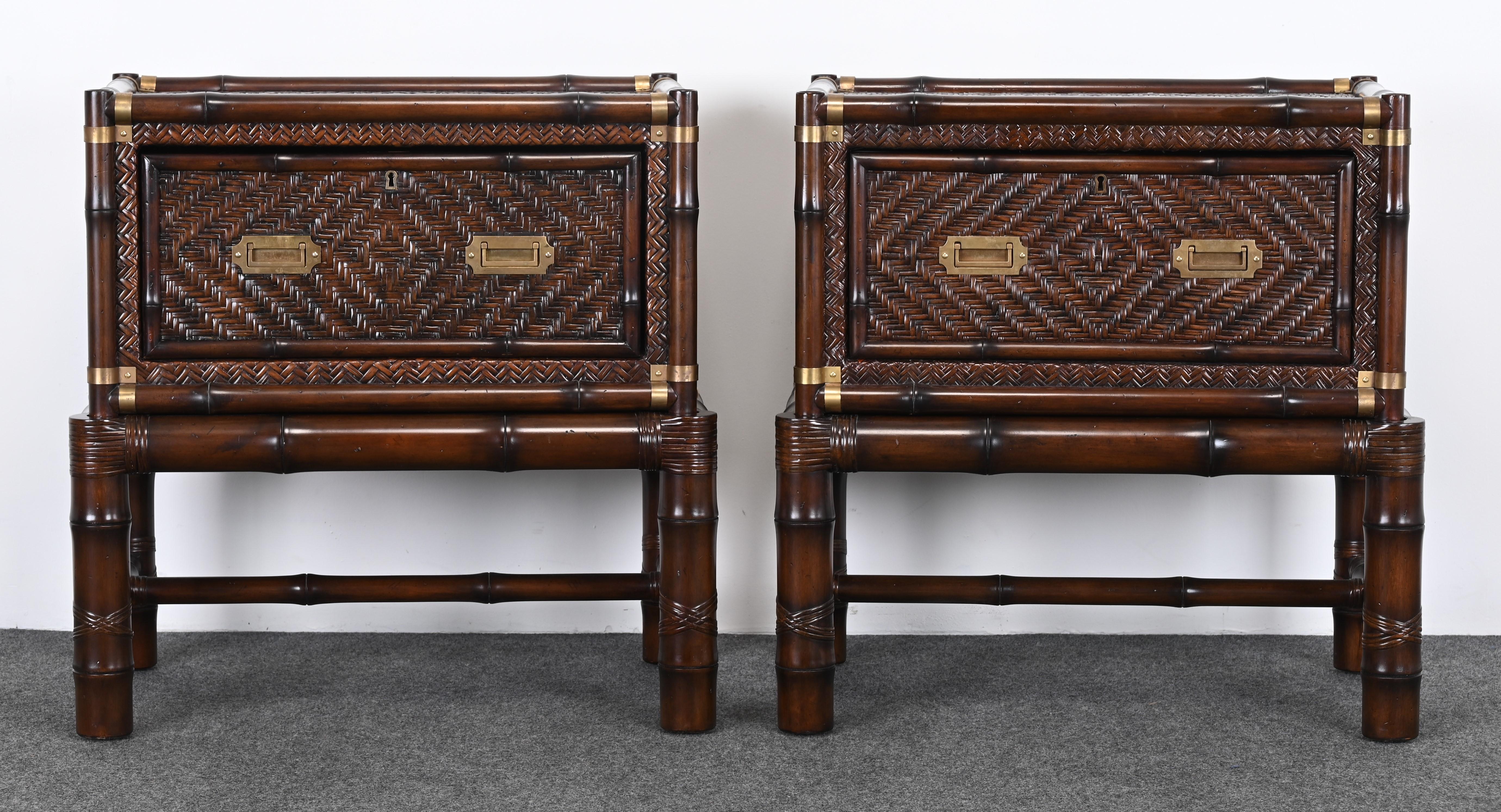 A stunning pair of nightstands or bedside tables by Ralph Lauren. The richness of the wood coordinated with the rattan adds a regal touch. The brass handles and accents are an elegant feature. The tops sit on a solid bamboo base.  All four pieces