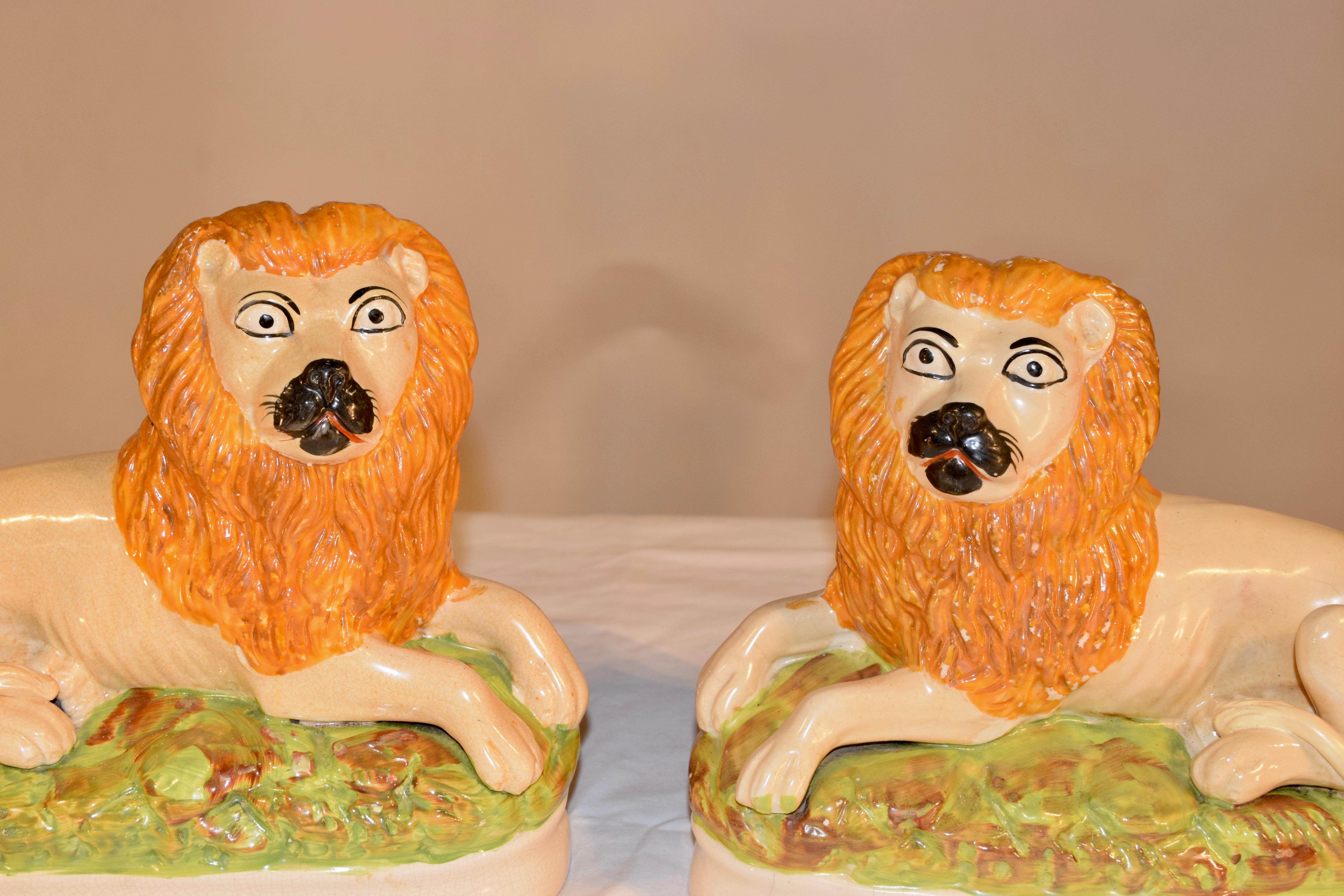 Victorian Pair of Rare 19th Century Staffordshire Lions For Sale