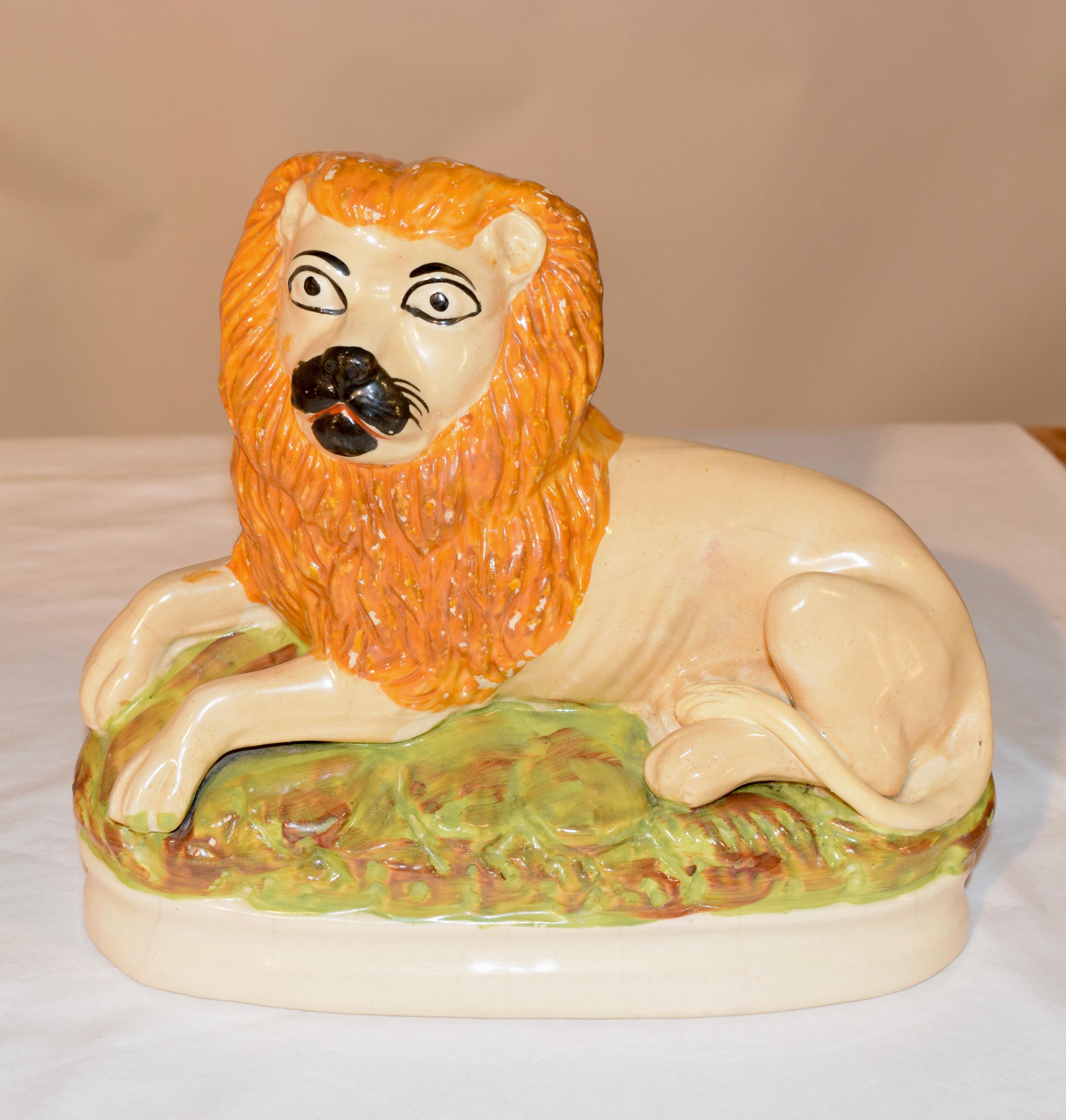 Glazed Pair of Rare 19th Century Staffordshire Lions For Sale
