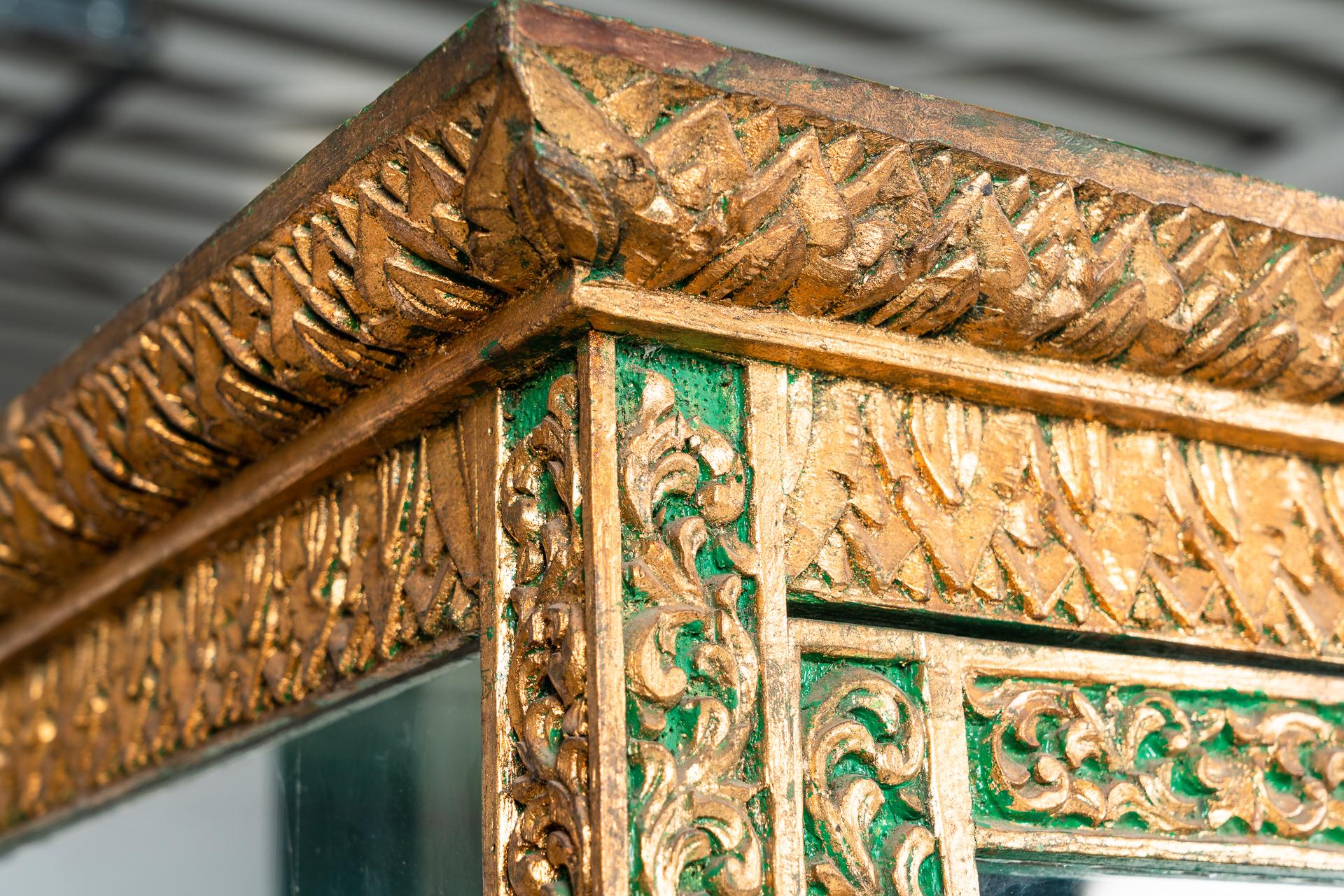 These 2 beautiful glas cabinet from Thailand and are made from hand carved teakwood and have a base of antique green paint with golden details.
Definitely a rare pair of antique cabinets which have their uniqueness in the detailed carved