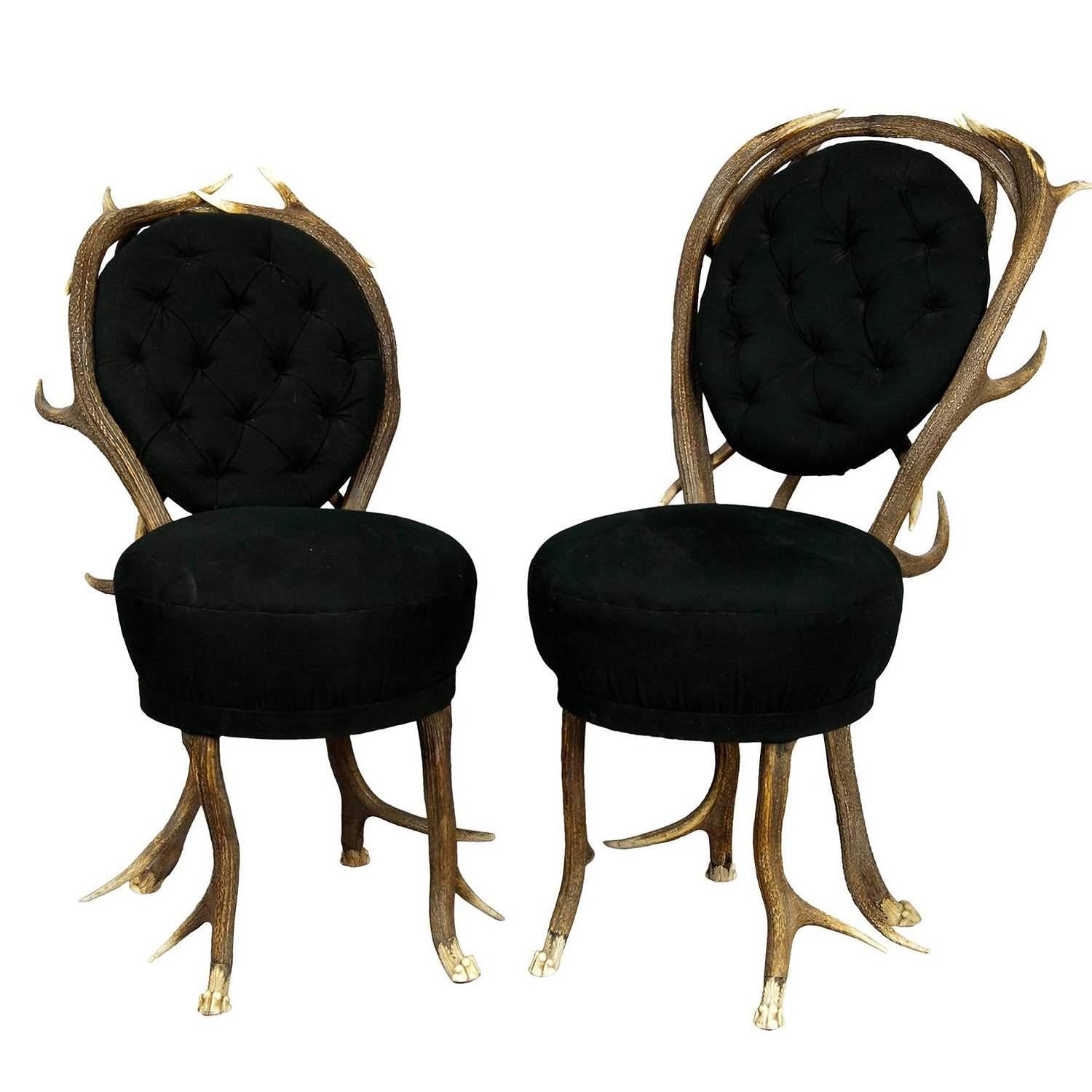 Pair of rare Antler Parlor Chairs, France ca. 1860

These two very rare antler parlor chairs are made of stag antlers with feet carved as lions claws. Made in France, ca. 1860 - the covering is renewed.

Antler furniture have been one of the popular