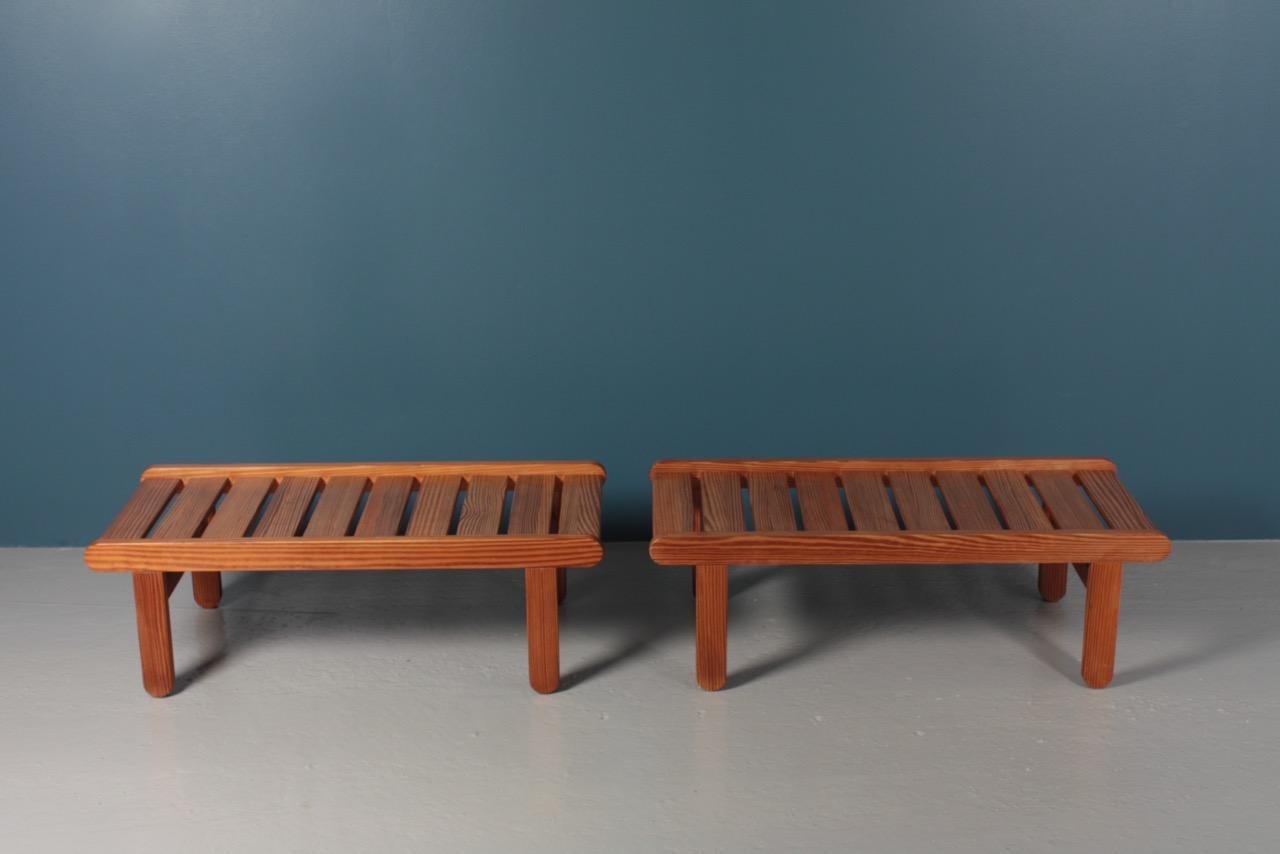 Pair of benches in Scandinavian solid pine. Designed by Bernt Pedersen for Eilersen cabinetmakers. Made in Denmark, 1960s. Great original condition.