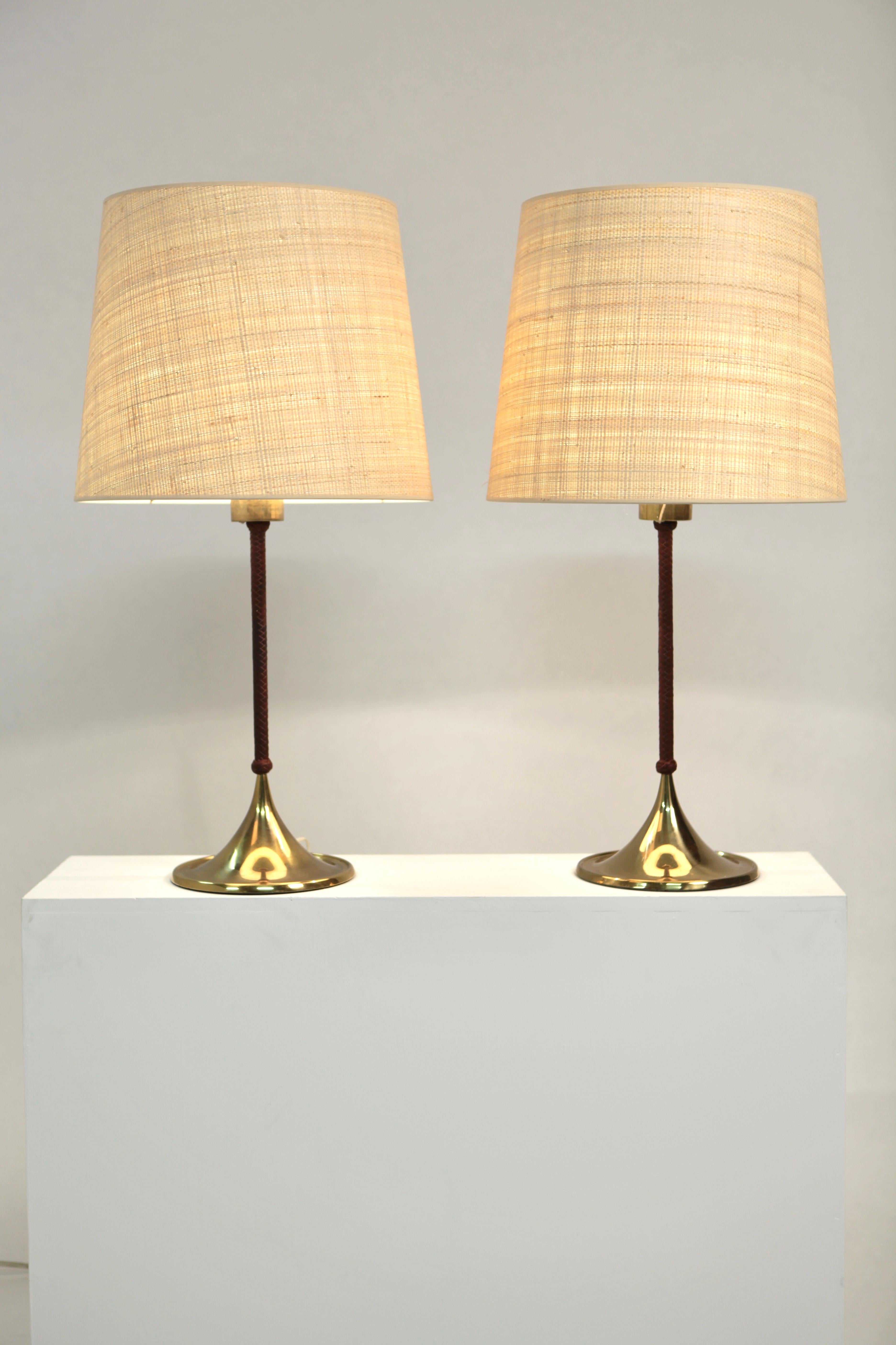 A rare pair of table lamps, model B-024 in brass and braided leather covered stem.
Produced in Sweden in the 1950s. Good vintage condition.
Please note, the Raffia shades are nor original and are not included in the sales price.