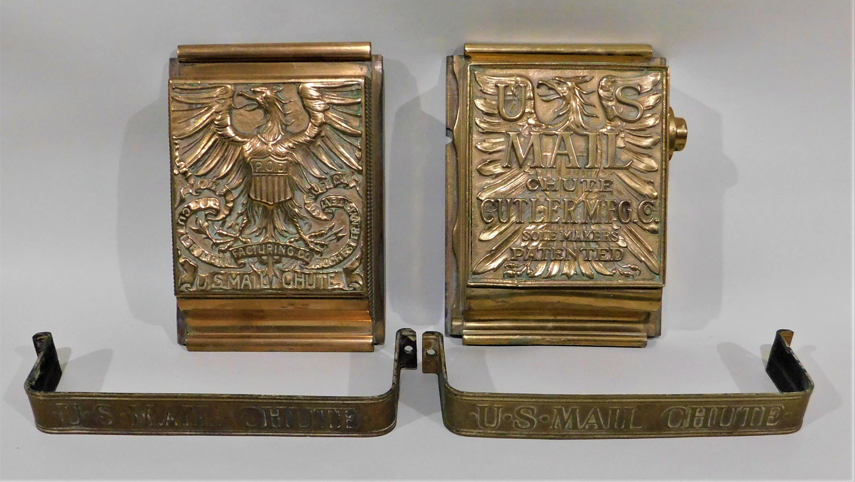 Pairs of antique American 19th century U.S. brass postal mail wall chutes with eagle designs and door pulls made by the Cutler Manufacturing Company. These came out of a bank from Williams Street in New York City's financial district. The door pulls