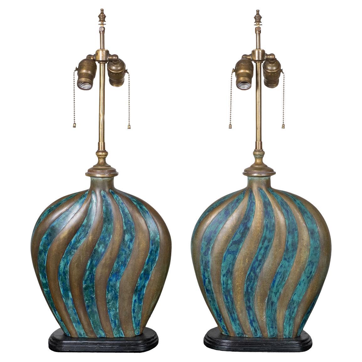 Pair of rare bronze table lamps by Pepe Mendoza For Sale